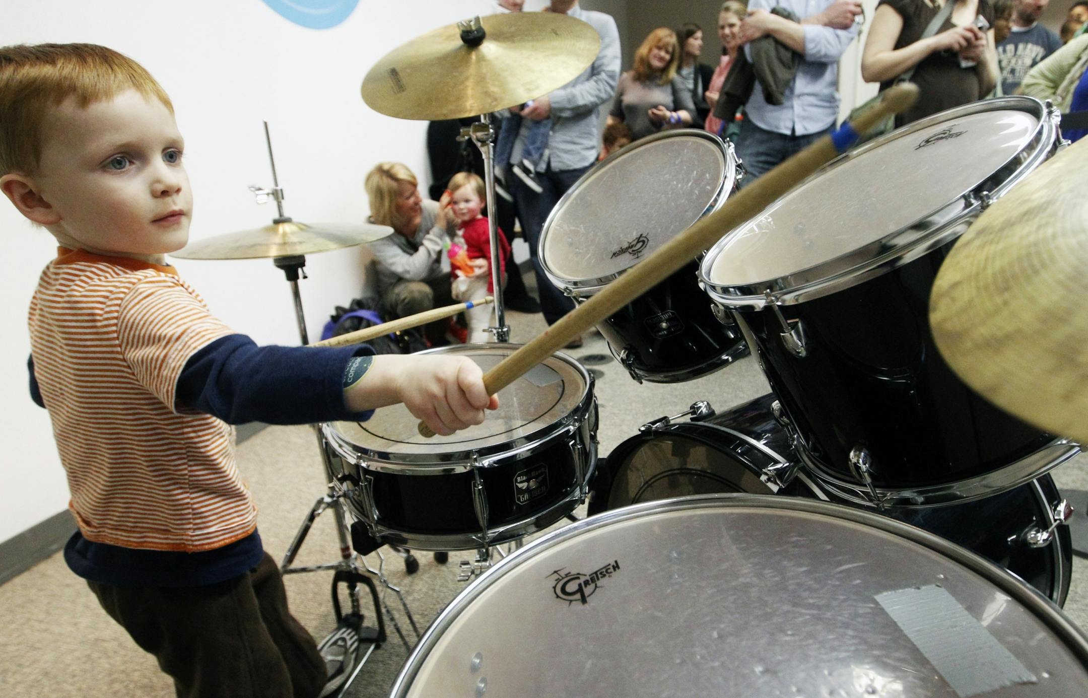 At the "Rock the Cradle" event held at the Minneapolis Art Institute on February 26, 2012, Orson Fabb,3, of Brooklyn Park rocked out on the drums in the musical petting zoo area where children were free to try out new things. Fabb sights R.E.M. and Led Zepplin as musical influences .