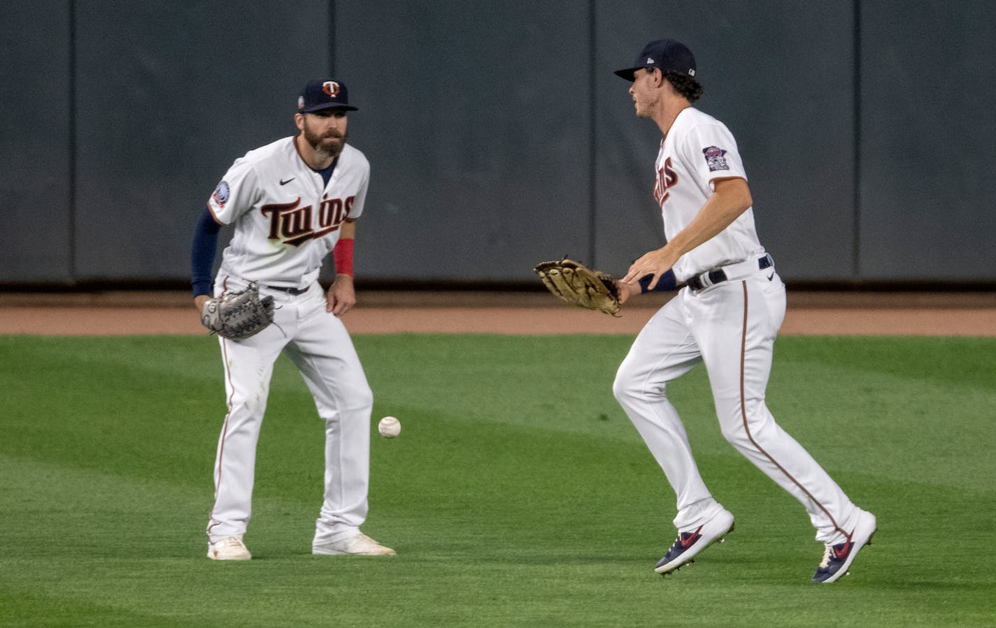 Twins outfielders Jake Cave and Max Kepler watched the ball fall out of Kepler's glove in the ninth inning, an error that led to three unearned White Sox runs.