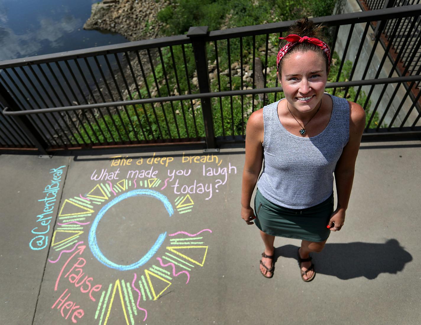 Taylor Tinkham, 29, stood next to a chalk drawing she made as part of CeMental Breaks, a movement she started and is hoping will catch on across the state where she creates chalk drawings in public places encouraging mindfulness and reflection and seen near Water Power Park Tuesday, Aug. 6, 2019, in Minneapolis, MN.] DAVID JOLES &#x2022; david.joles@startribune.com Taylor Tinkham started CeMental Breaks, a movement she's hoping will catch on across the state where she creates chalk drawings in p