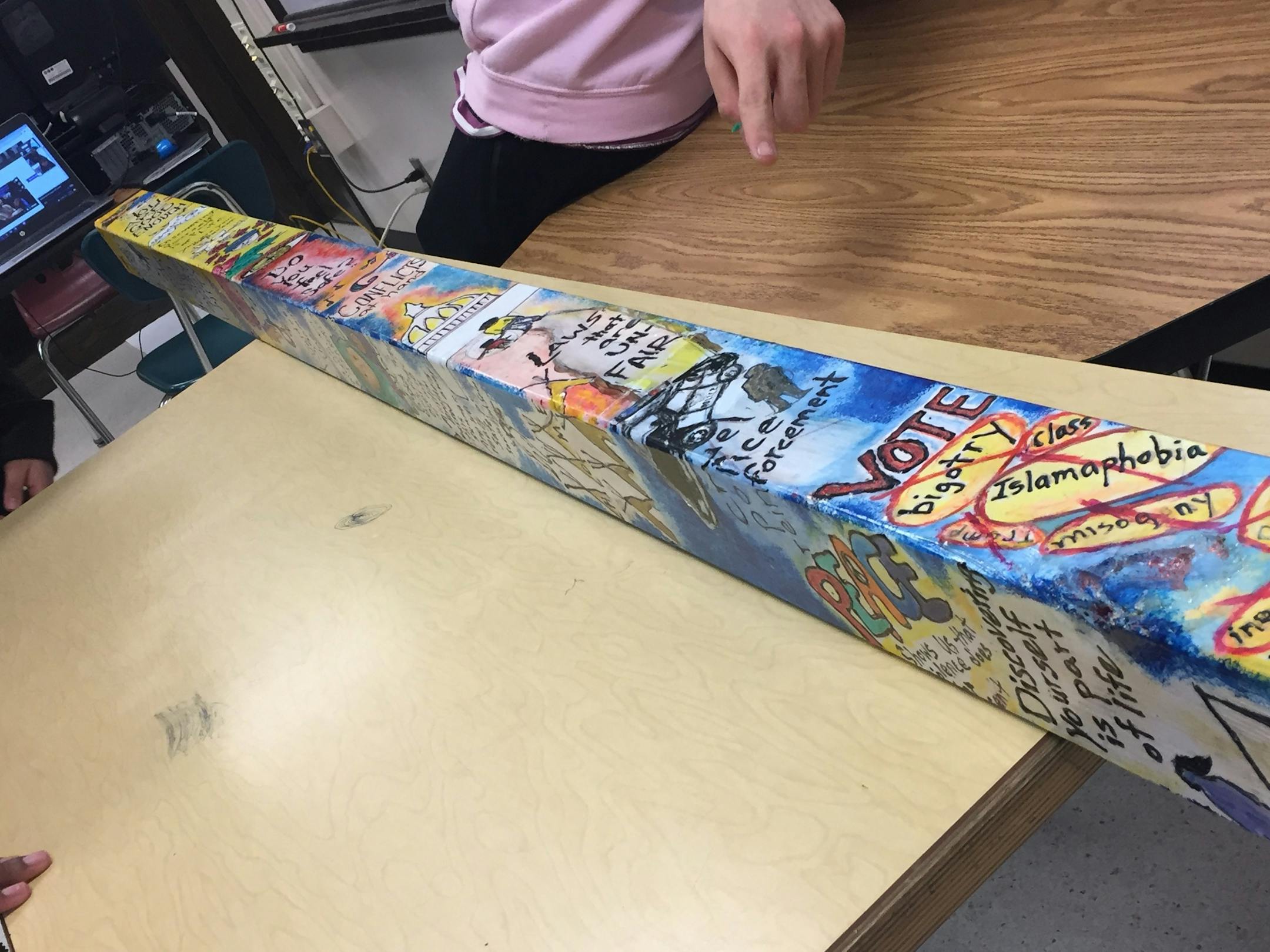 South High students worked with a group of artists to create an artwork to help restore their relationship with law enforcement.