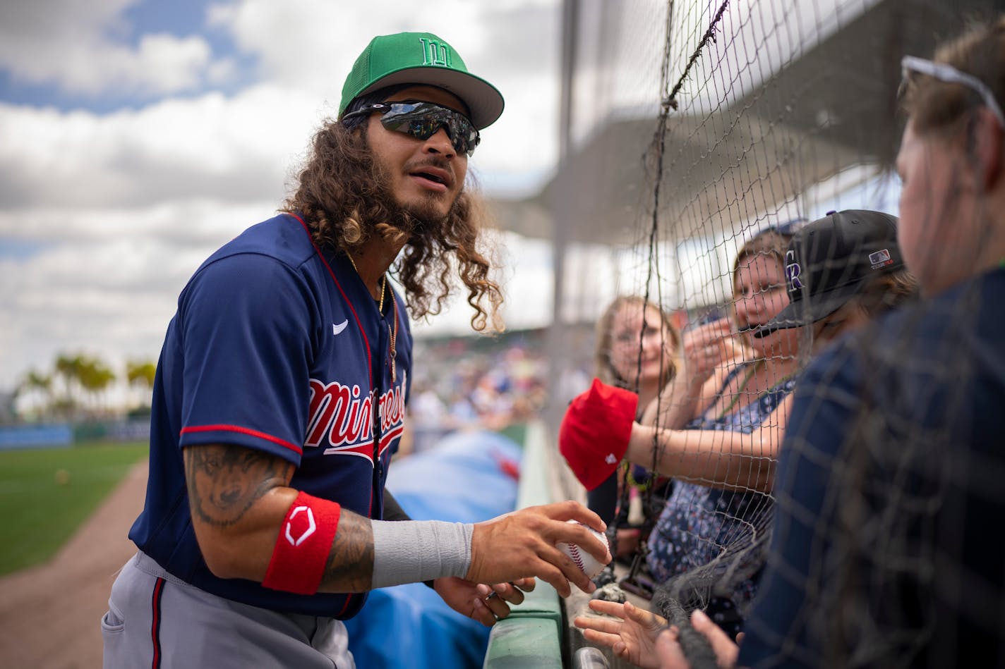 Minnesota Twins infielder Austin Martin signed autographs before the game.