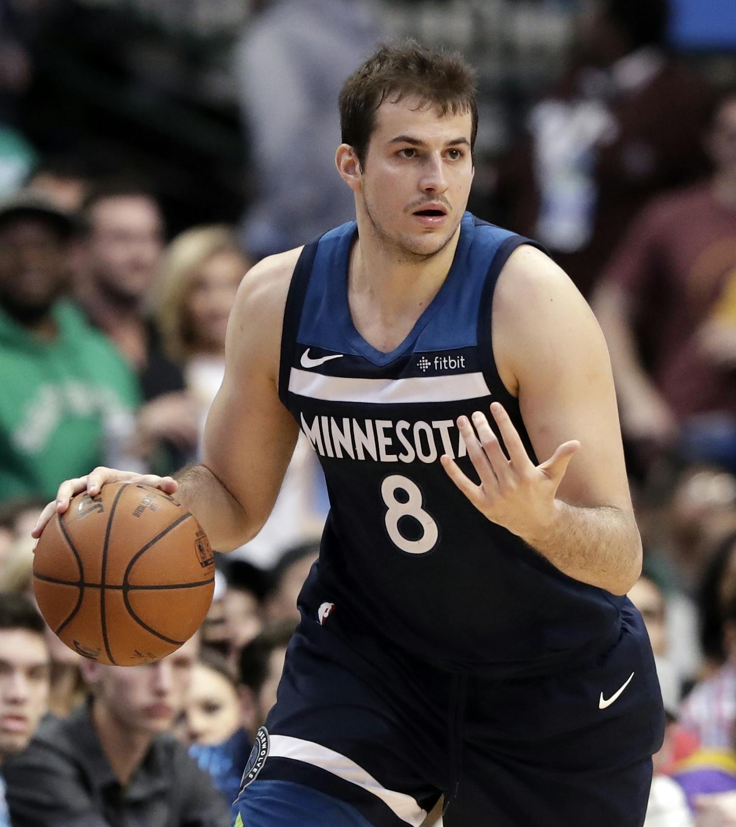 Minnesota Timberwolves forward Nemanja Bjelica (8) handles the ball during an NBA basketball game against the Dallas Mavericks in Dallas, Friday, March 30, 2018. (AP Photo/Tony Gutierrez)