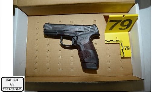 The Mossberg 9mm pistol Devondre Phillips fired repeatedly inside Seventh Street Truck Park on Oct. 10, 2021. It will remain stored in evidence until Phillips serves his sentence for eight counts of attempted murder, then it will be destroyed.