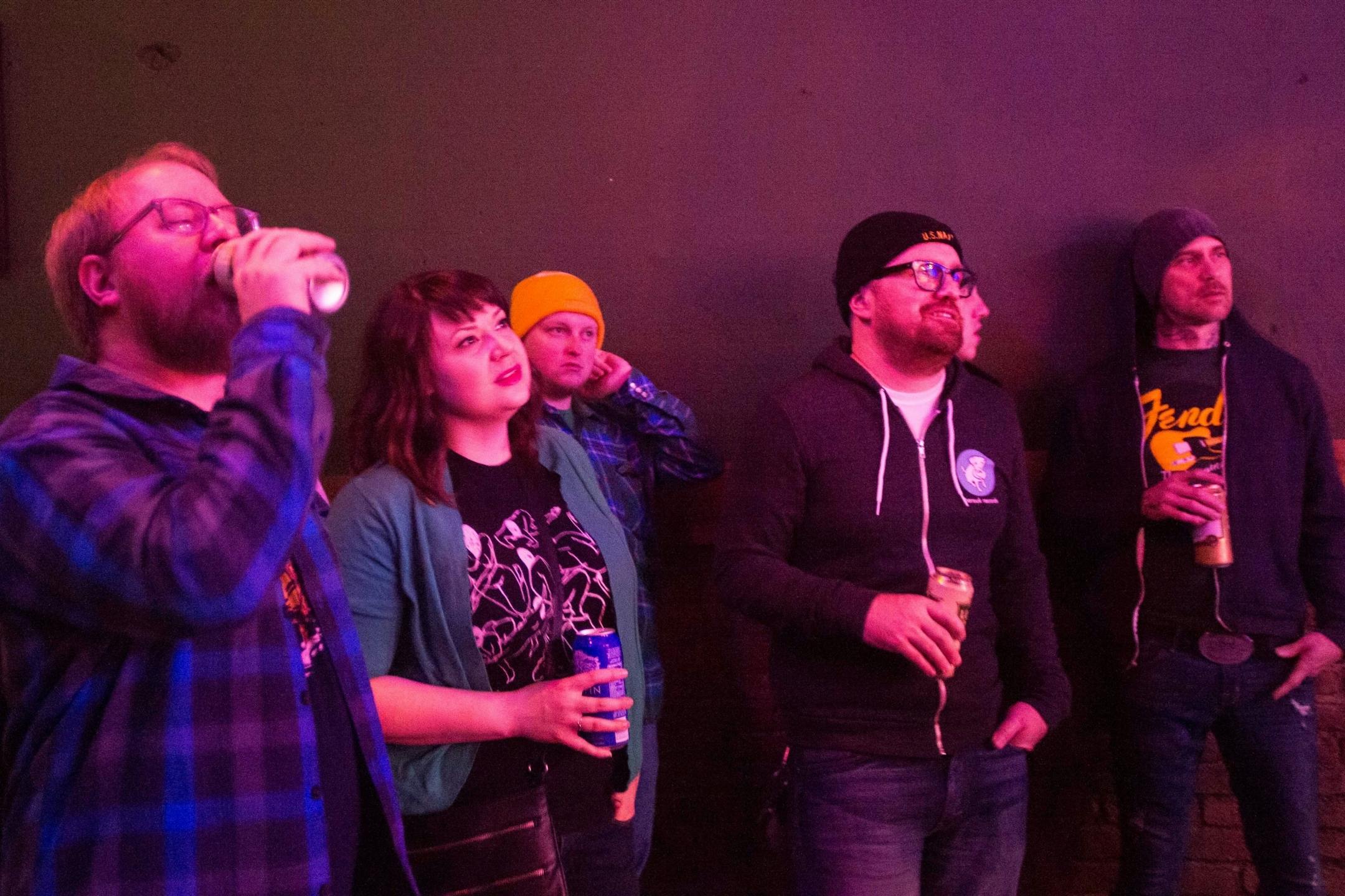 Show goers watch Appetite for Zaccardi's performance at Turf Club Saturday morning.