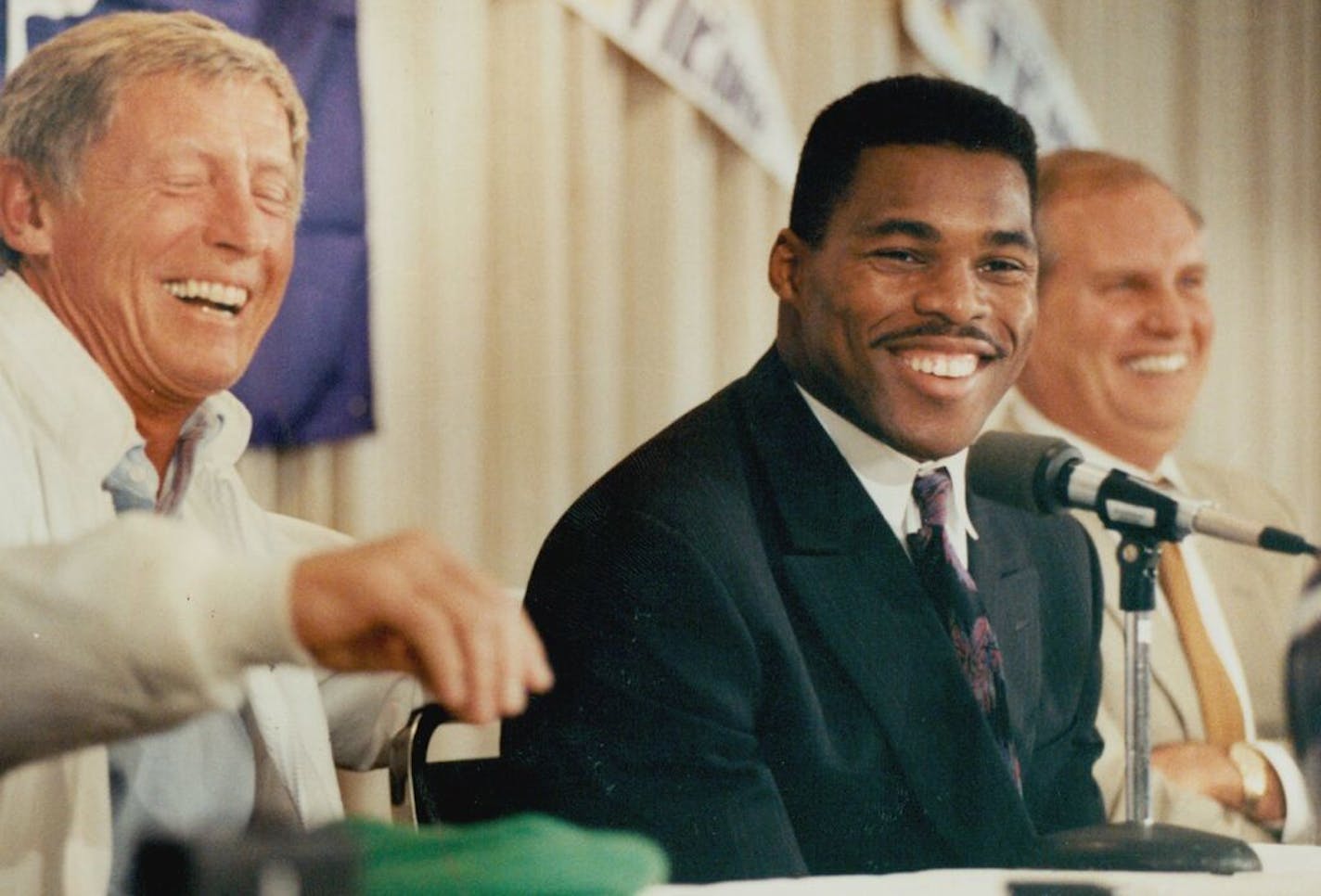 Vikings coach Jerry Burns, Herschel Walker and general manger Mile Lynn. Photo: Brian Peterson, Minneapolis Star Tribune