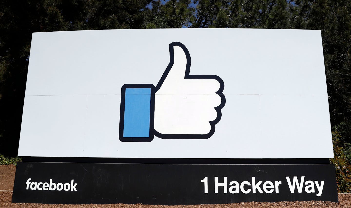 FILE- This March 28, 2018, file photo shows the Facebook logo at the company's headquarters in Menlo Park, Calif. Facebook says it will stop spending money to fight a proposed California ballot initiative aimed at giving consumers more control over their data. (AP Photo/Marcio Jose Sanchez, File)