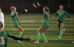 Edina’s Izzy Engle, left, and teammates celebrated a goal, another step toward becoming the All-Metro Sports Award Girls Team of the Year.