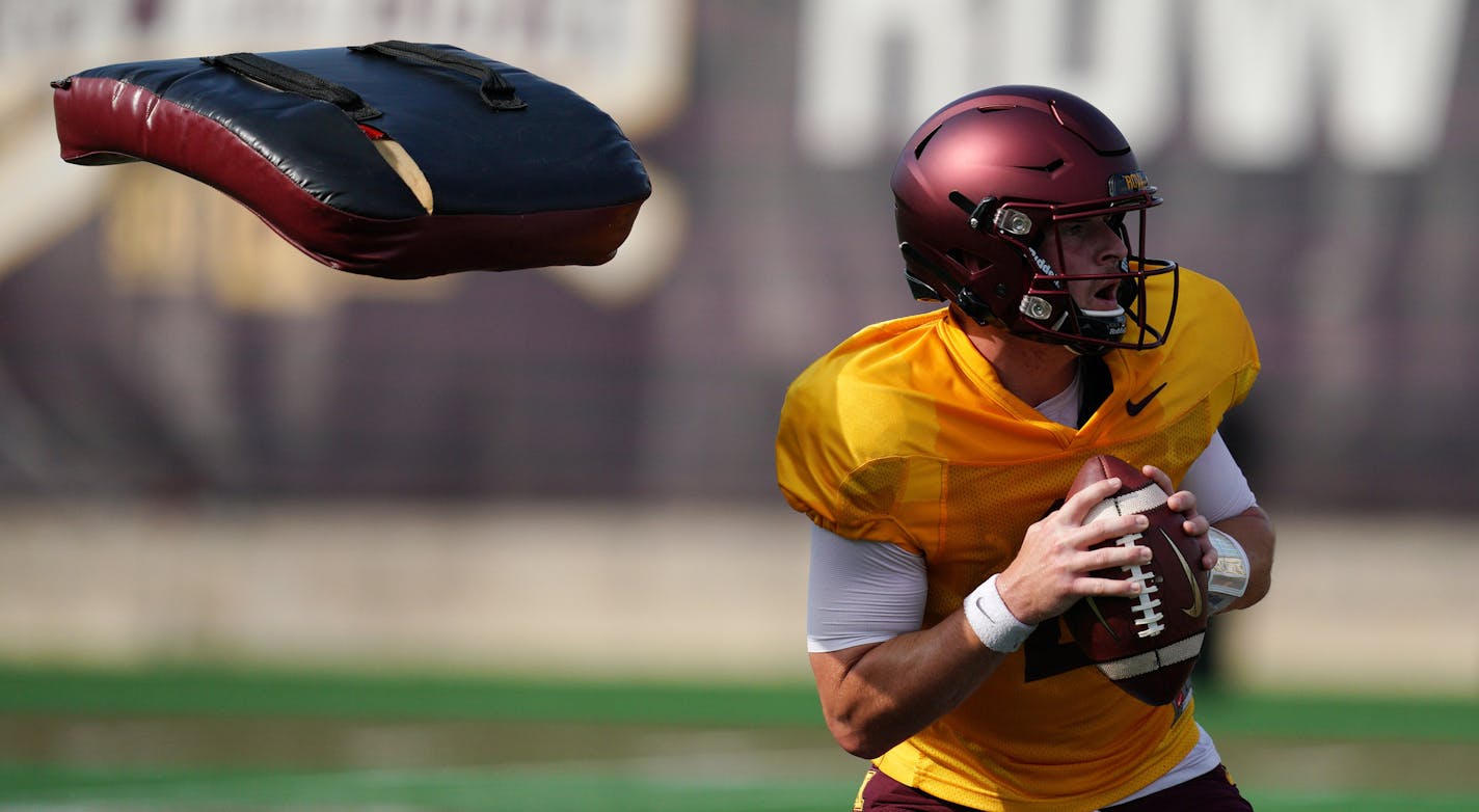 Minnesota Golden Gophers quarterback Tanner Morgan (2) dodged pads thrown at him during a drill at practice Friday. ] ANTHONY SOUFFLE &#x2022; anthony.souffle@startribune.com The Minnesota Golden Gophers football team held an open practice Friday, Aug. 19, 2019 at Athlete's Village on the grounds of the University of Minnesota in Minneapolis.