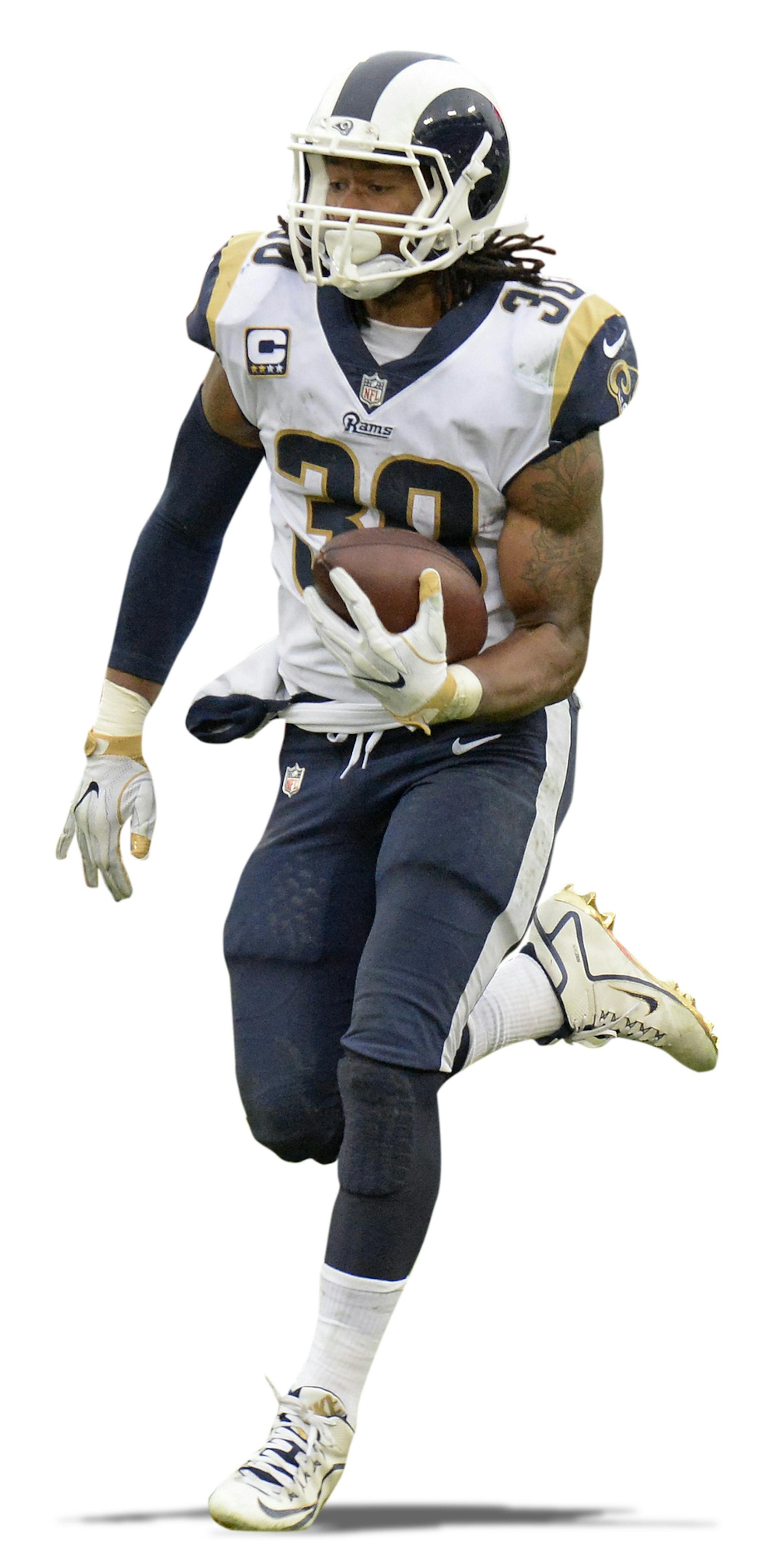 Los Angeles Rams running back Todd Gurley (30) leaves Tennessee Titans defenders Brice McCain (23) and Erik Walden (93) behind as Gurley scores a touchdown on an 80-yard pass reception in the first half of an NFL football game Sunday, Dec. 24, 2017, in Nashville, Tenn. (AP Photo/Mark Zaleski) ORG XMIT: TNMH122