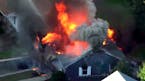 In this image take from video provided by WCVB in Boston, flames consume a home in Lawrence, Mass, a suburb of Boston, Thursday, Sept. 13, 2018. Emerg