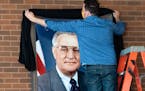 Vice President Walter Mondale’s portrait was draped with a black sash Tuesday morning at the University of Minnesota Law School. Mondale Hall is nam