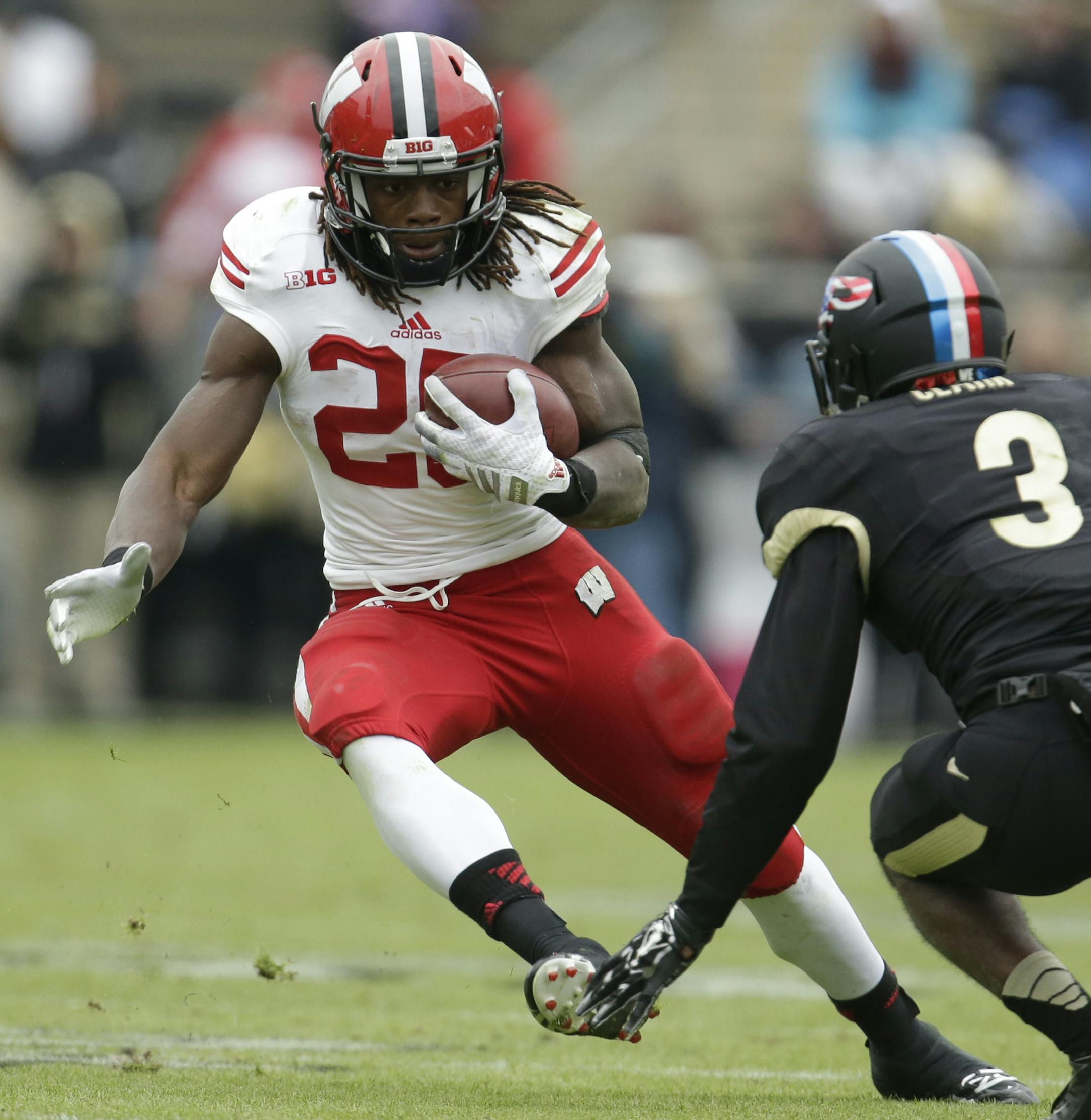 Wisconsin running back Melvin Gordon (25) in action during an NCAA college football game between Purdue and Wisconsin in West Lafayette, Ind.,Saturday, Nov. 8, 2014. Wisconsin won 34-16. (AP Photo/AJ Mast) ORG XMIT: OTKINAM209 ORG XMIT: MIN1411131738028530