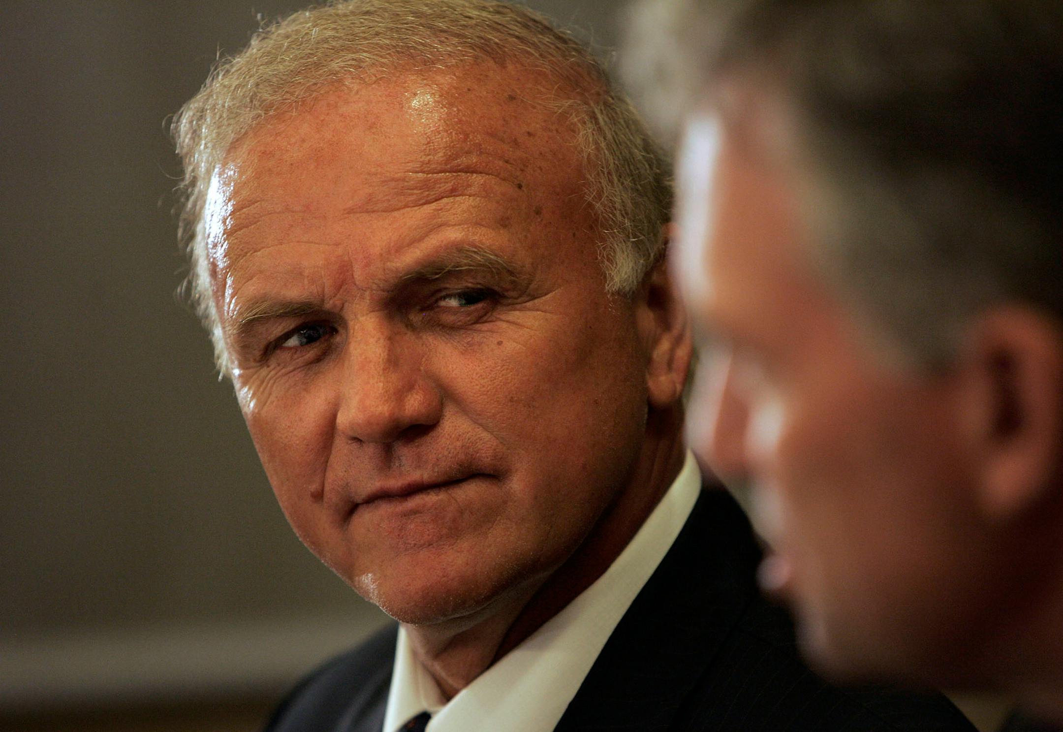 Minnesota Wild head coach Jacques Lemaire, left, listens to Wild general manager Doug Risebrough as they sit together at lunch before meeting with members of the media Monday, Sept. 12, 2005, at the Xcel Energy Center during a media luncheon.