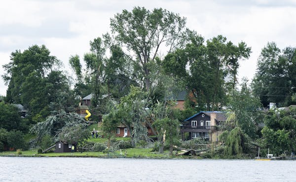 Damage from a reported tornado is seen on Bone Lake in Scandia.