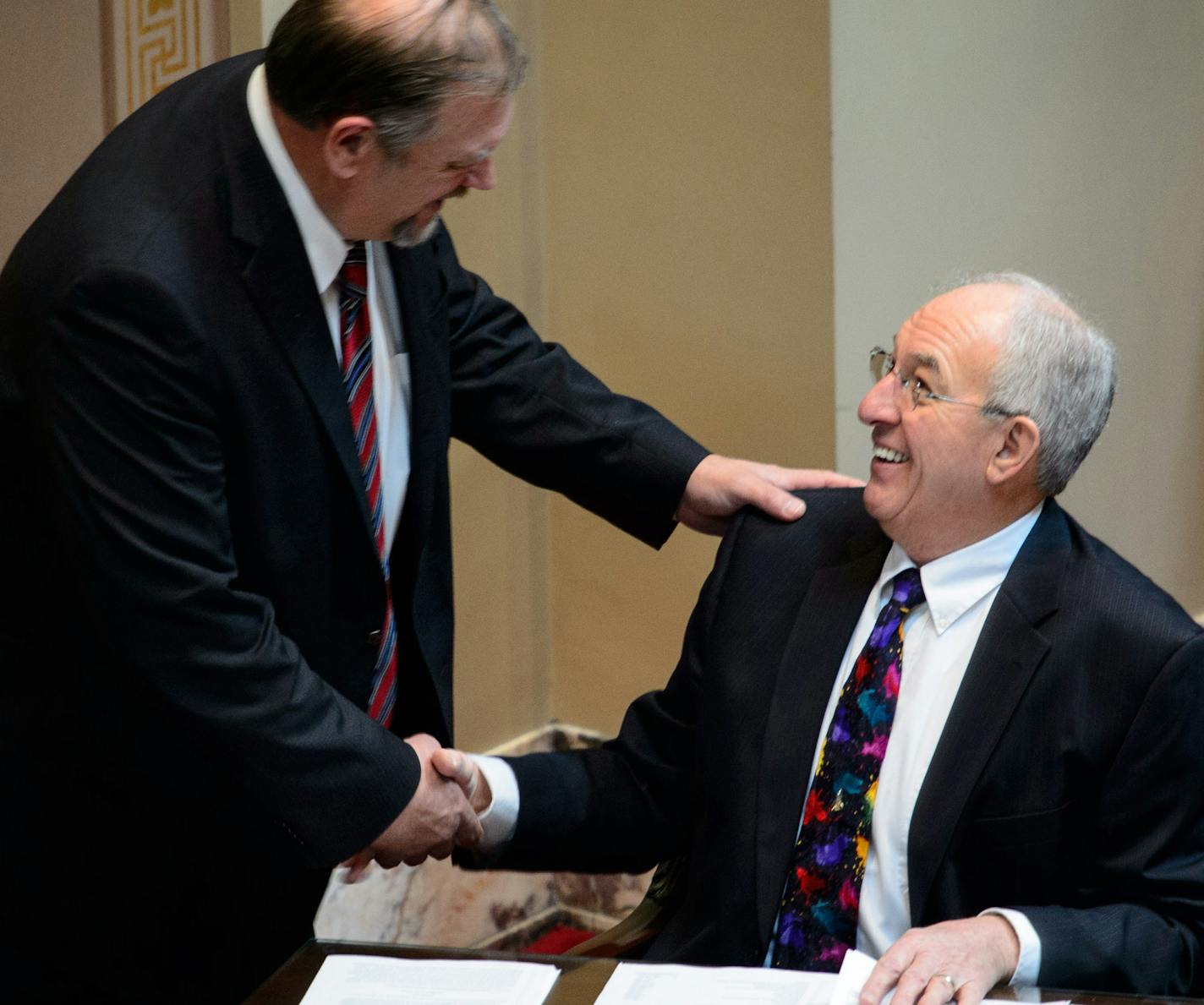 Senate Majority Leader Tom Bakk congratulated bonding bill author Sen. LeRoy Stumpf after the bill passed the Senate. ] Friday, May 16, 2014 GLEN STUBBE * gstubbe@startribune.com