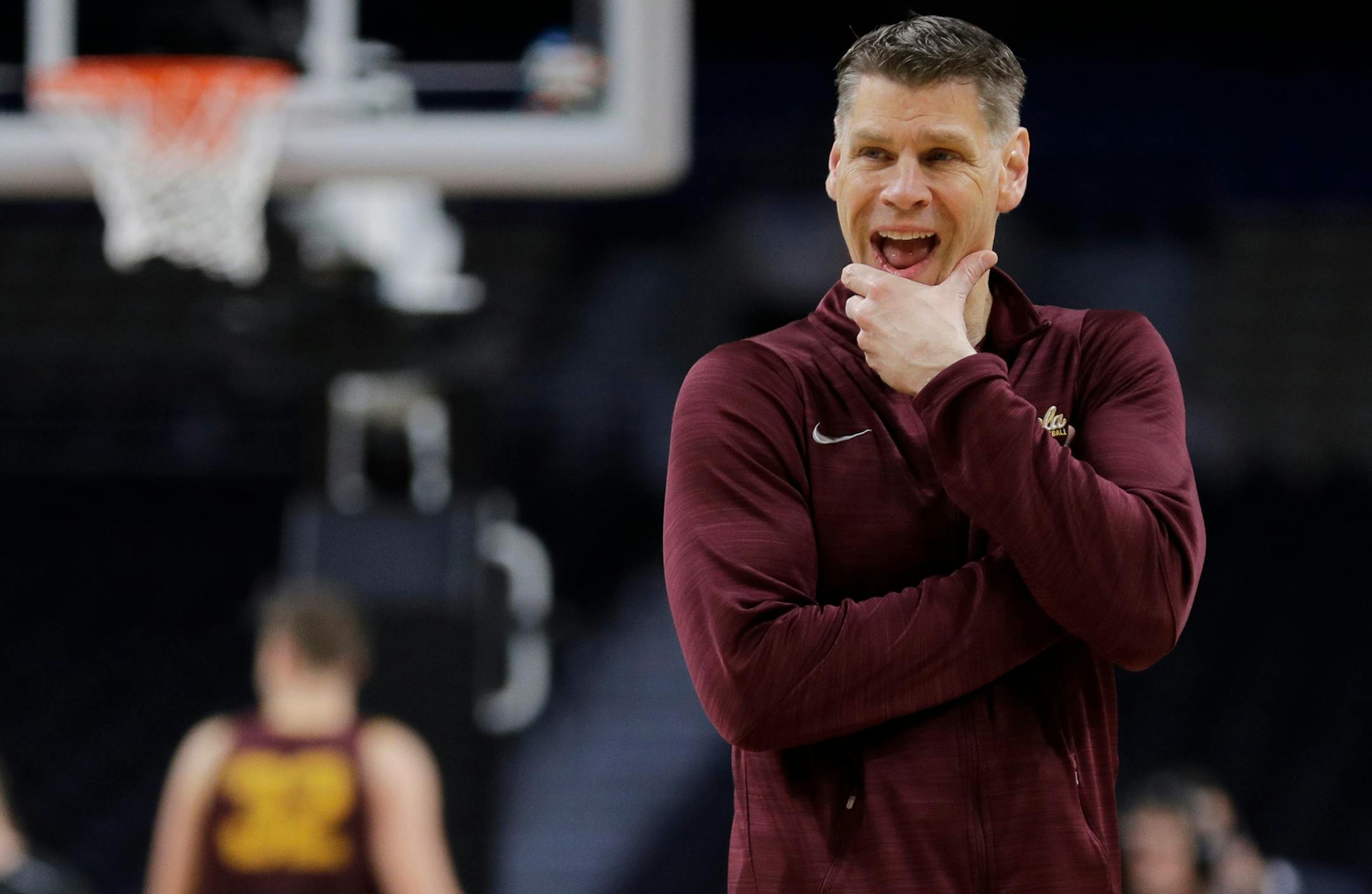 Loyola-Chicago head coach Porter Moser watches his players during a practice session for the Final Four NCAA college basketball tournament, Friday, March 30, 2018, in San Antonio. (AP Photo/David J. Phillip)