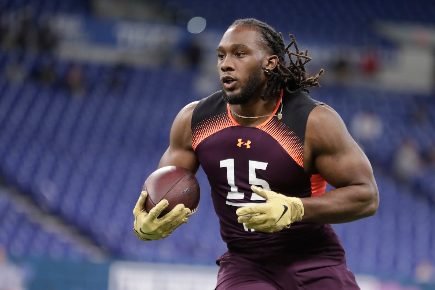 Boise State running back Alexander Mattison runs a drill at the NFL football scouting combine in Indianapolis