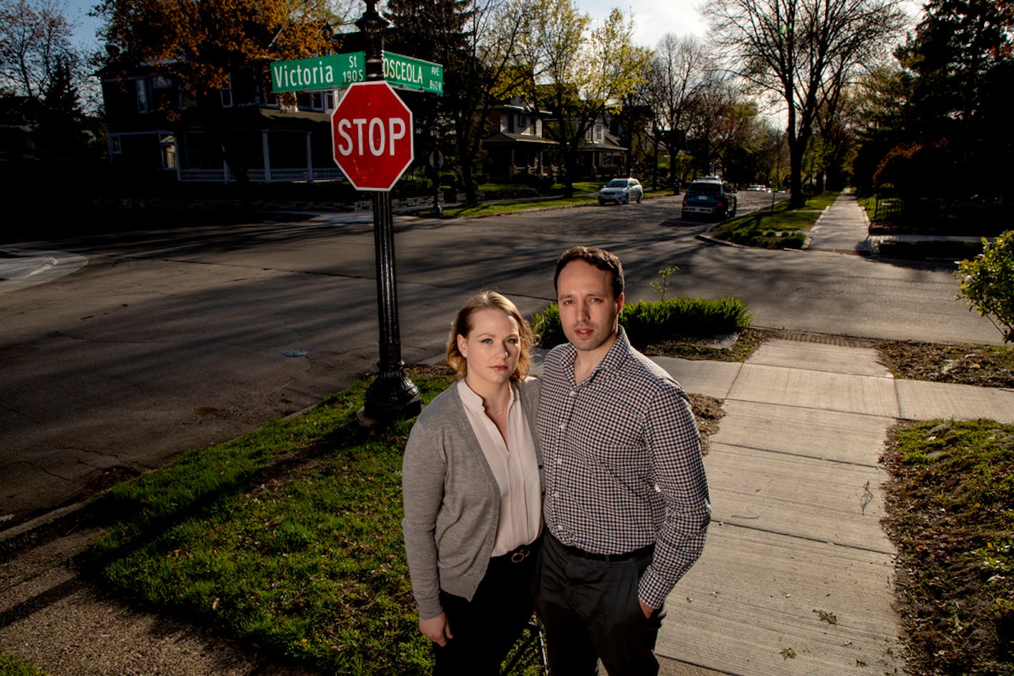 Christina Anderson-Taghioff and Simon Taghioff near their home in St. Paul in May. He was among those attending City Council meetings in April to challenge the fairness of St. Paul's street assessment system.