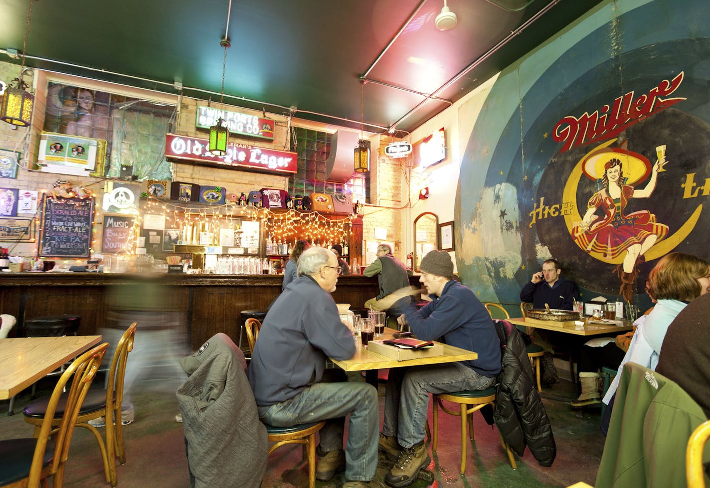 Locals at the Thirsty Pagan, a brewpub and pizza joint, in Superior, Wis., Jan. 7, 2011. In an area where winter delivers about 7 feet of snow annually, Northland brewers revel in the season, savoring the opportunity to experiment with spices and fruits, bigger bodies and higher alcohol contents. (T.C. Worley/The New York Times) -- PHOTO MOVED IN ADVANCE AND NOT FOR USE - ONLINE OR IN PRINT - BEFORE FEB. 06, 2011.