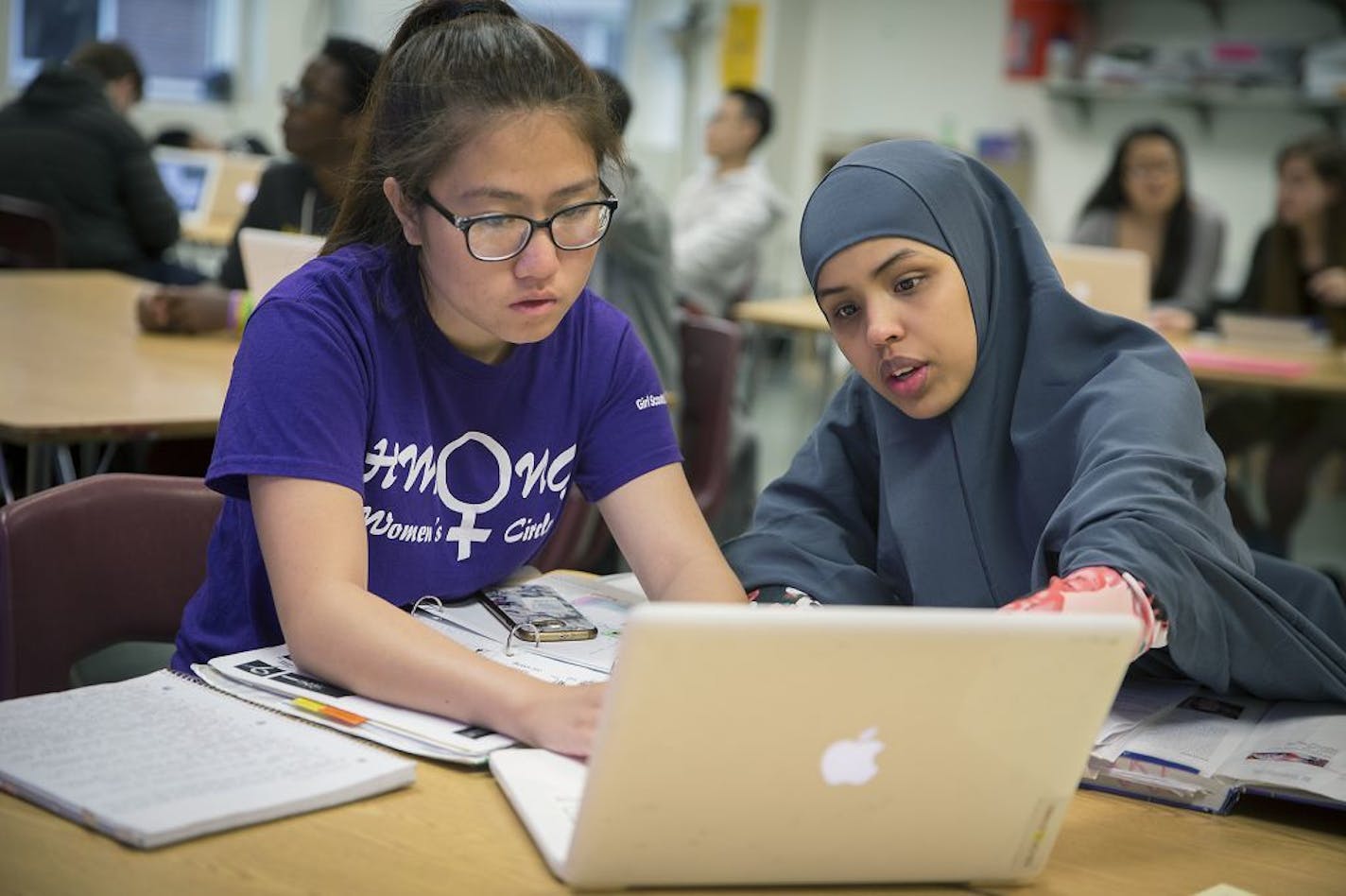 The change in start times mean that high school students will start school at 8:30 a.m. starting this fall in the St. Paul schools. Above, Washington Tech Magnet High School juniors Ann Lee, left, and Nabiha Ali worked on an AP biology in 2018.