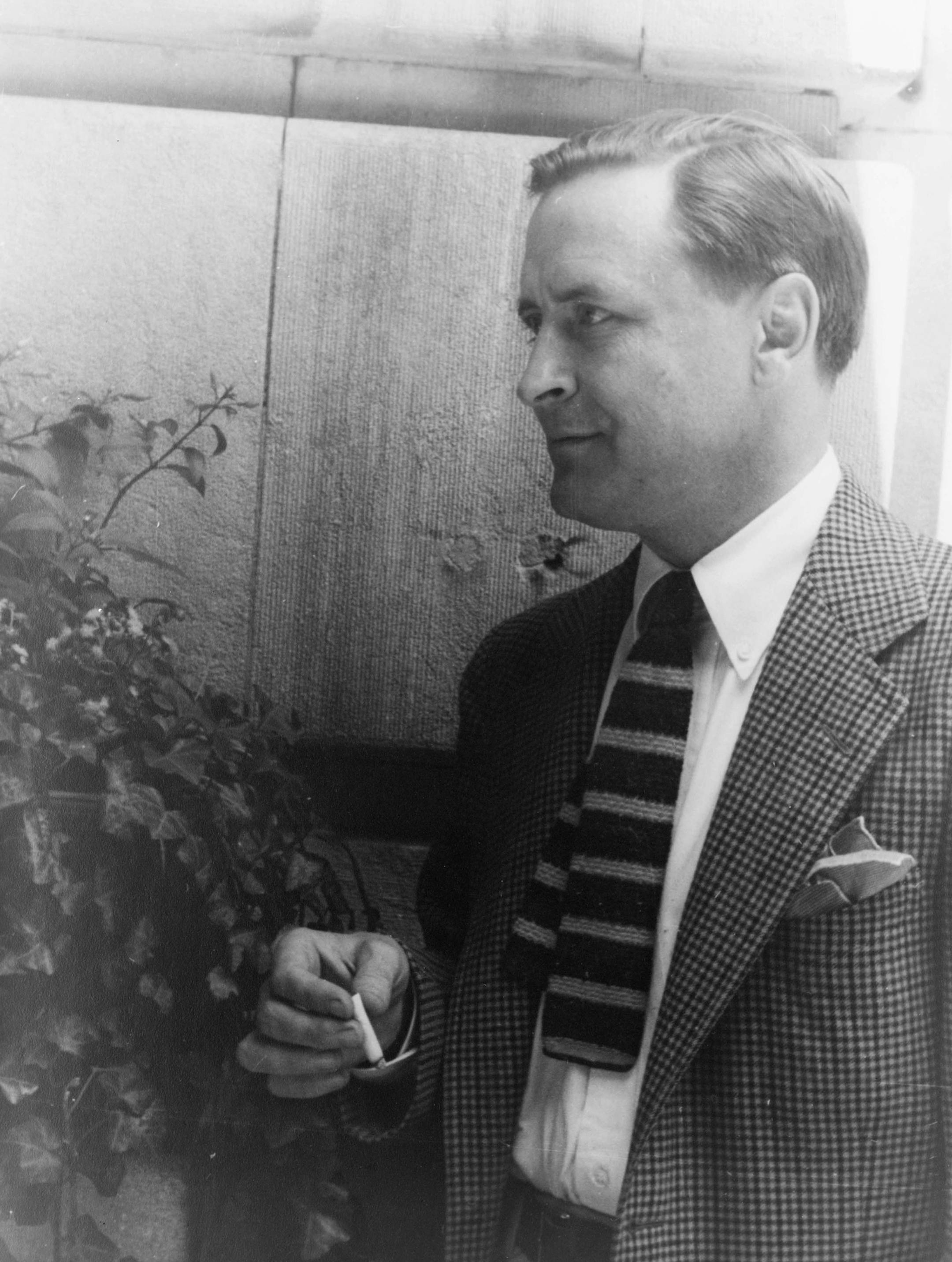 In this photo provided by the Library of Congress, F. Scott Fitzgerald smokes a cigaretter at the Algonquin Hotel in New York in 1937. (AP Photo/Library of Congress, Carl Van Vechten) ORG XMIT: NY138