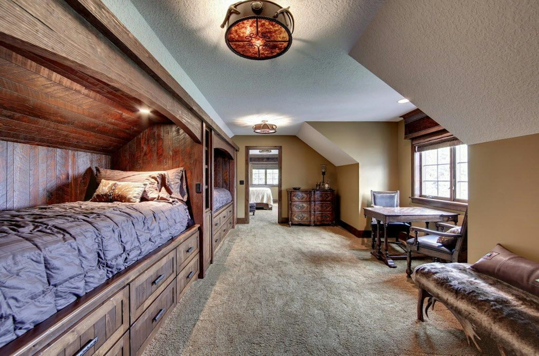 Above the poolhouse is a sleeping loft.