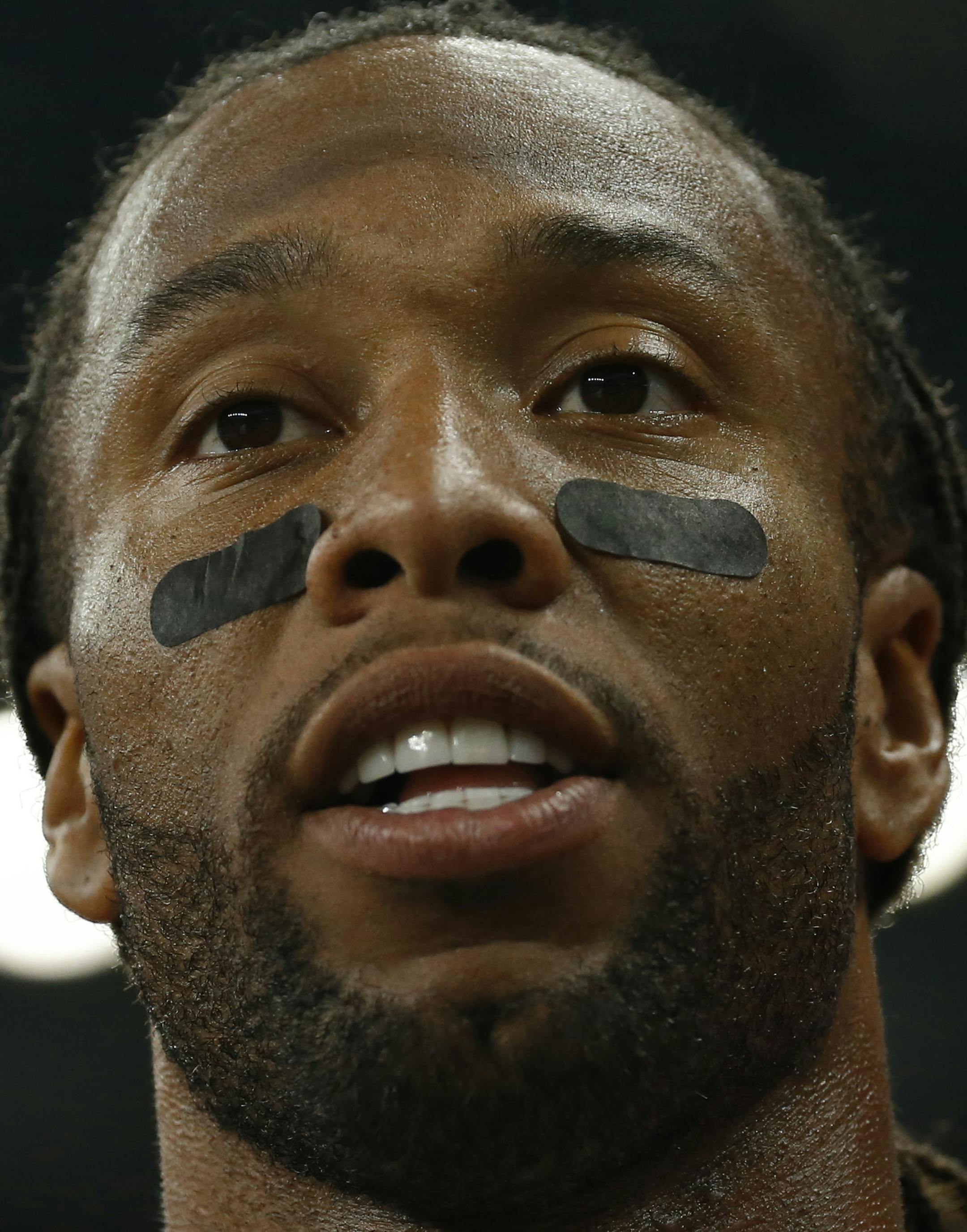 Arizona Cardinals wide receiver Larry Fitzgerald (11) watches against the Detroit Lions during the first half of an NFL football game, Sunday, Oct. 11, 2015, in Detroit. (AP Photo/Paul Sancya) ORG XMIT: DTF1