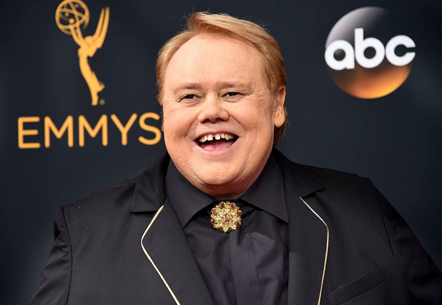 Louie Anderson arrives at the 68th Primetime Emmy Awards on Sunday, Sept. 18, 2016, at the Microsoft Theater in Los Angeles.