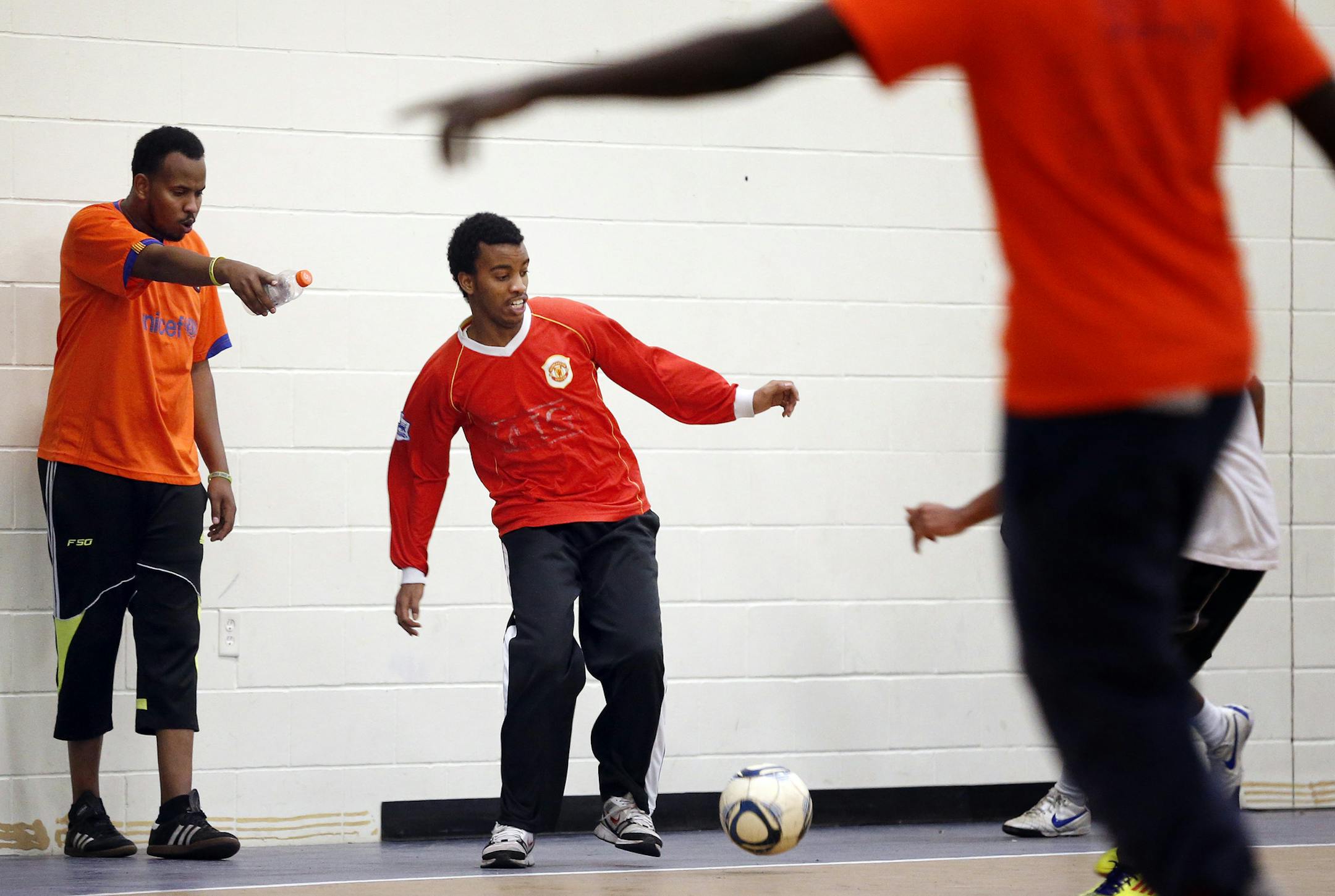 Affordable space is limited for most Minneapolis soccer teams, especially in the winter. Here, a team squeezes into the gymnasium at Dugsi Academy in St. Paul.