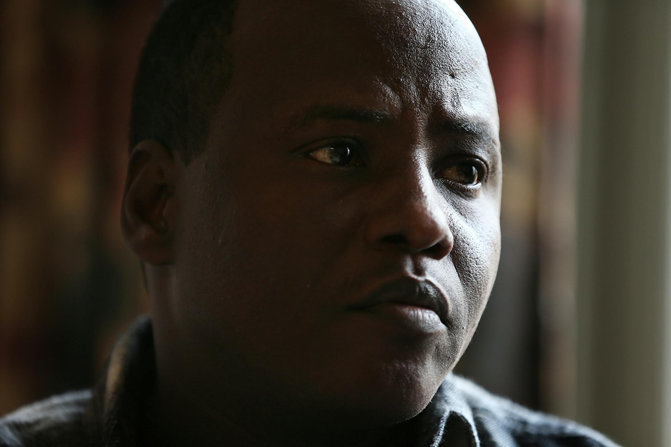 Somali immigrant Nur Ali lived in a refugee camp in Kenya for over twenty years before coming to the United States with his family, first to Connecticut and then to Minnesota, where they call Mary's Place transitional apartments home in downtown Minneapolis. ] LEILA NAVIDI leila.navidi@startribune.com / BACKGROUND INFORMATION: Tuesday, October 28, 2014. Minnesota has seen a marked uptick in new Somali refugee arrivals recently. The number of Somalis arriving directly from Africa has more than tr
