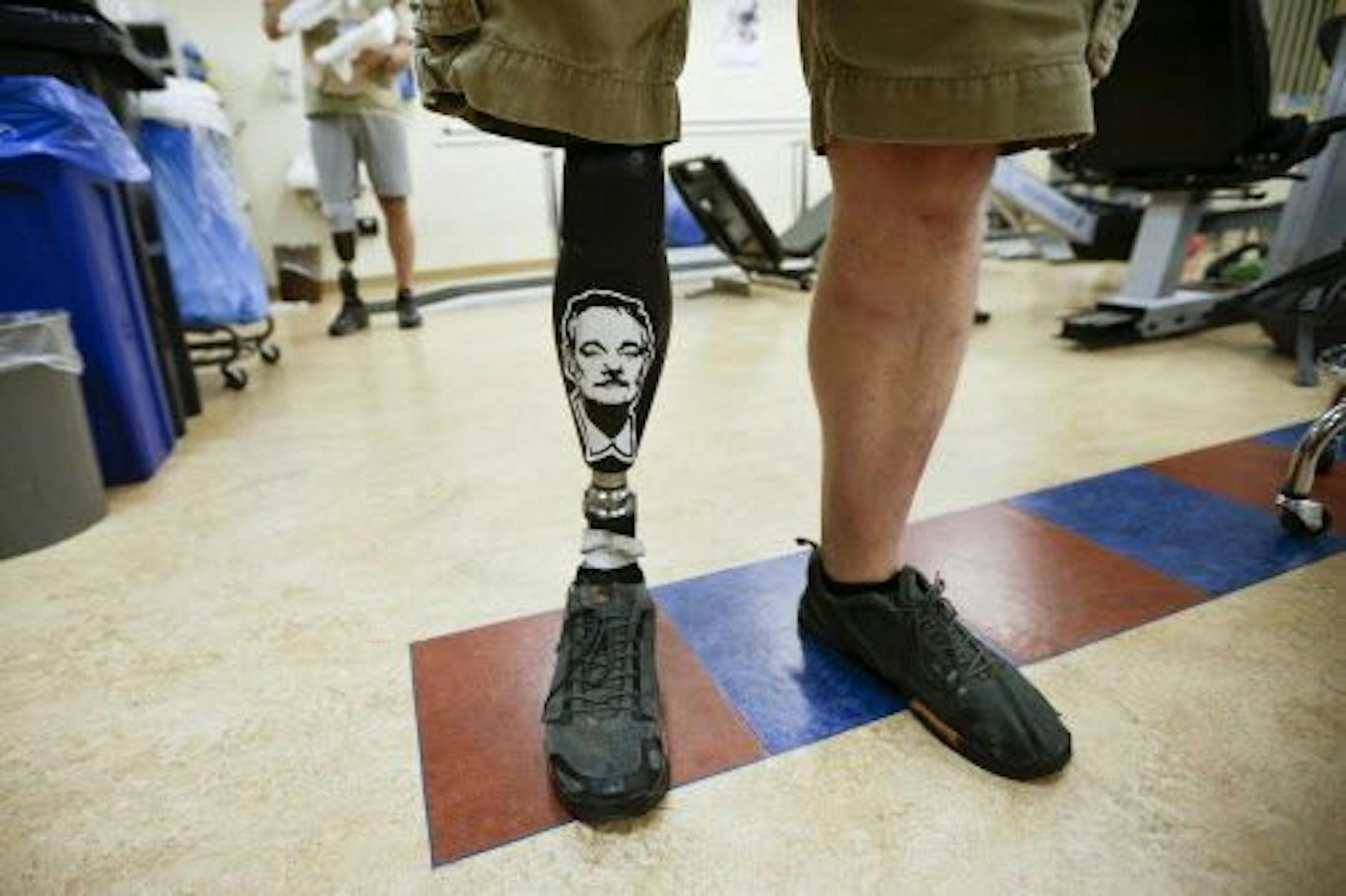 In this photo taken on May 23, 2014, retired Marine Gunnery Sgt. Brian Meyer stands on a prosthetic leg with a sticker of actor Bill Murray at the Naval Medical Center in San Diego.