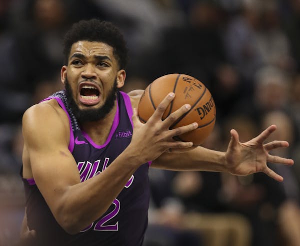 Minnesota Timberwolves center Karl-Anthony Towns (32) headed to the net where he put up a third quarter basket. He finished with 25 points for the nig