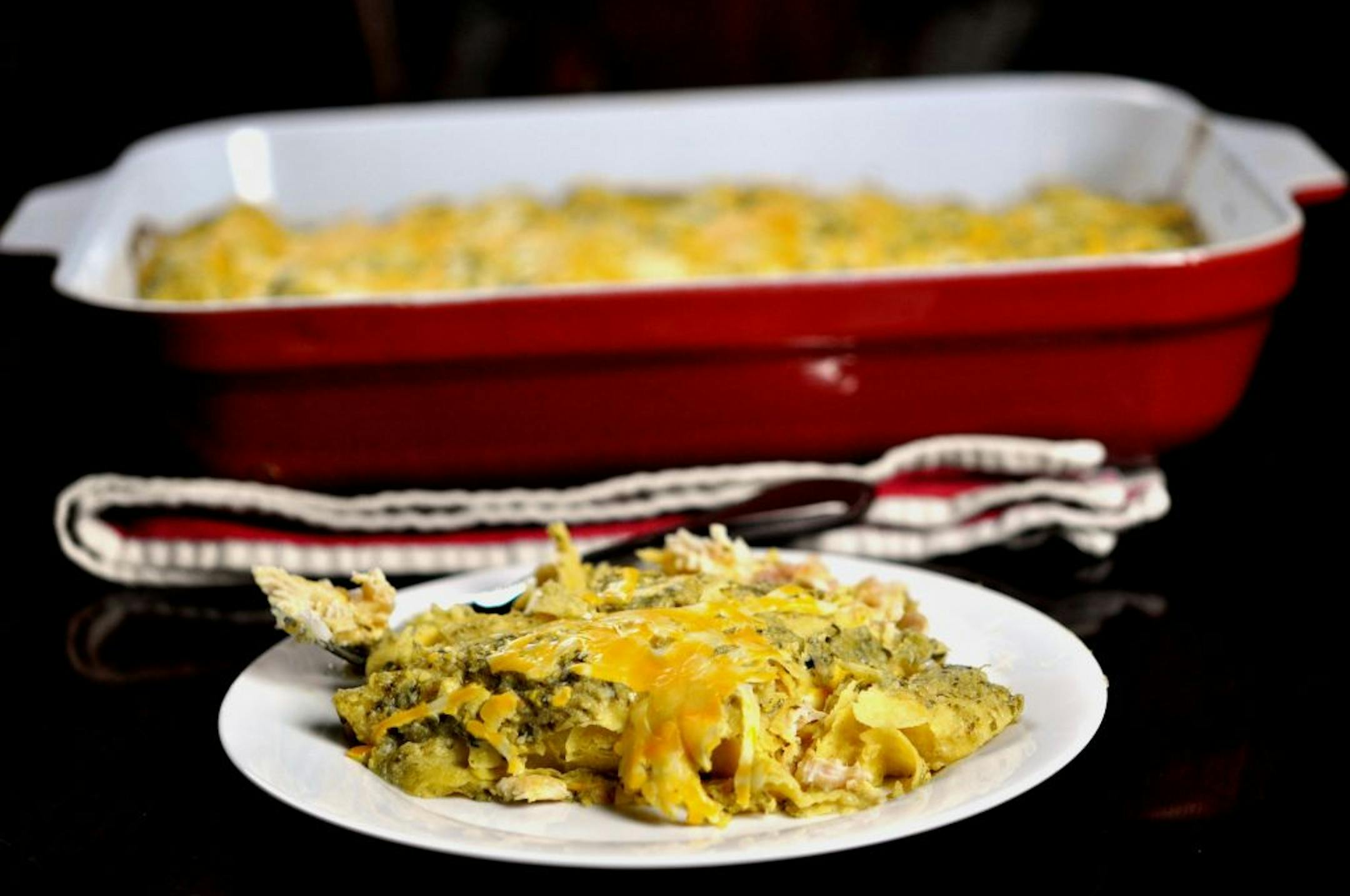Green chicken enchiladas with flavorful tomatillo salsa.