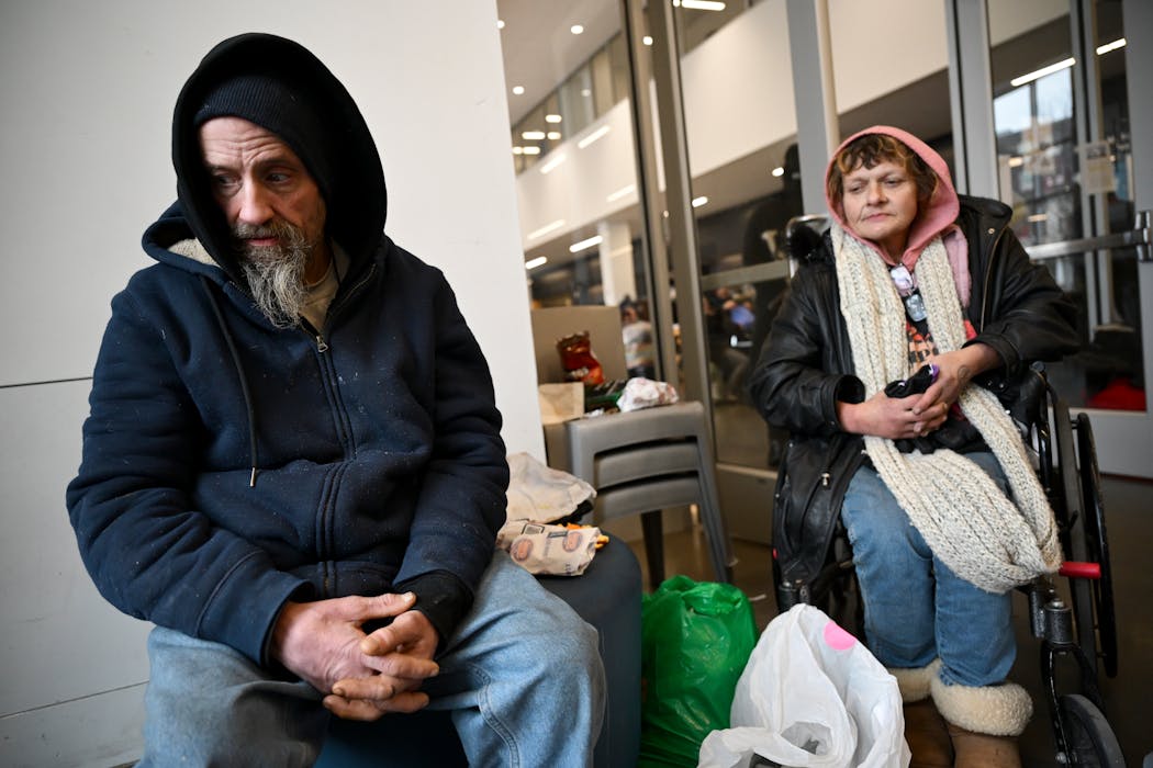 William Johnson and Laurie Mertz shelter from the cold Friday at the Dorothy Day Opportunity Center in St. Paul. “You get desperate in the cold,” said Mertz. “It’s kind of scary, especially at night. It seems like the colder it gets, the more people try to rob you.”