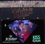 A couple kisses on the kiss cam during the Cleveland Indians vs. Twins baseball game at Target Field in Minneapolis, Minn., on Friday, July 19, 2013. ] (ANNA REED/STAR TRIBUNE) anna.reed@startribune.com (cq)