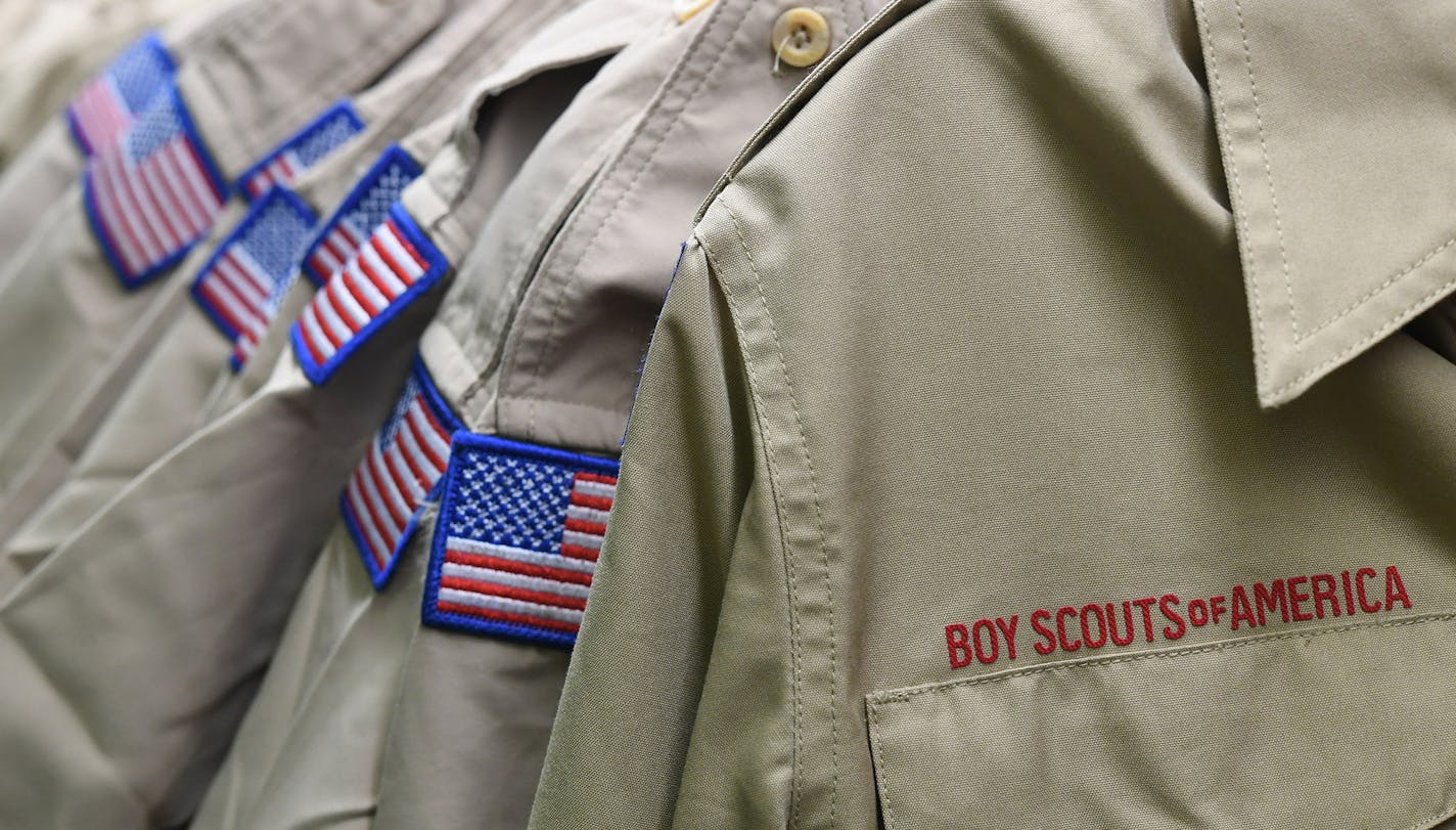 Boy Scout uniforms displayed Tuesday, Feb. 18, 2020, in the retail store at the headquarters for the French Creek Council of the Boy Scouts of America in Summit Township, Erie County, Pa. The national Boy Scouts of America urged victims to come forward Tuesday as the historic, 110-year-old organization filed for bankruptcy protection Tuesday, in the first step toward creating a huge compensation fund for potentially thousands of men who were sexually molested as youngsters decades ago by scoutma