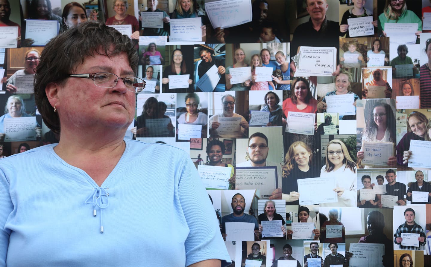 Rosemary Van Vickle, of Crosby, listened to other speakers with the faces of home health care workers behind her during the press conference. ] (KYNDELL HARKNESS/STAR TRIBUNE) kyndell.harkness@startribune.com Home health workers and the patients they care for held a press conference talking about the reasons why and the details of their plan to form a union in Minnesota in St. Paul, Min. Tuesday, July 8, 2014.