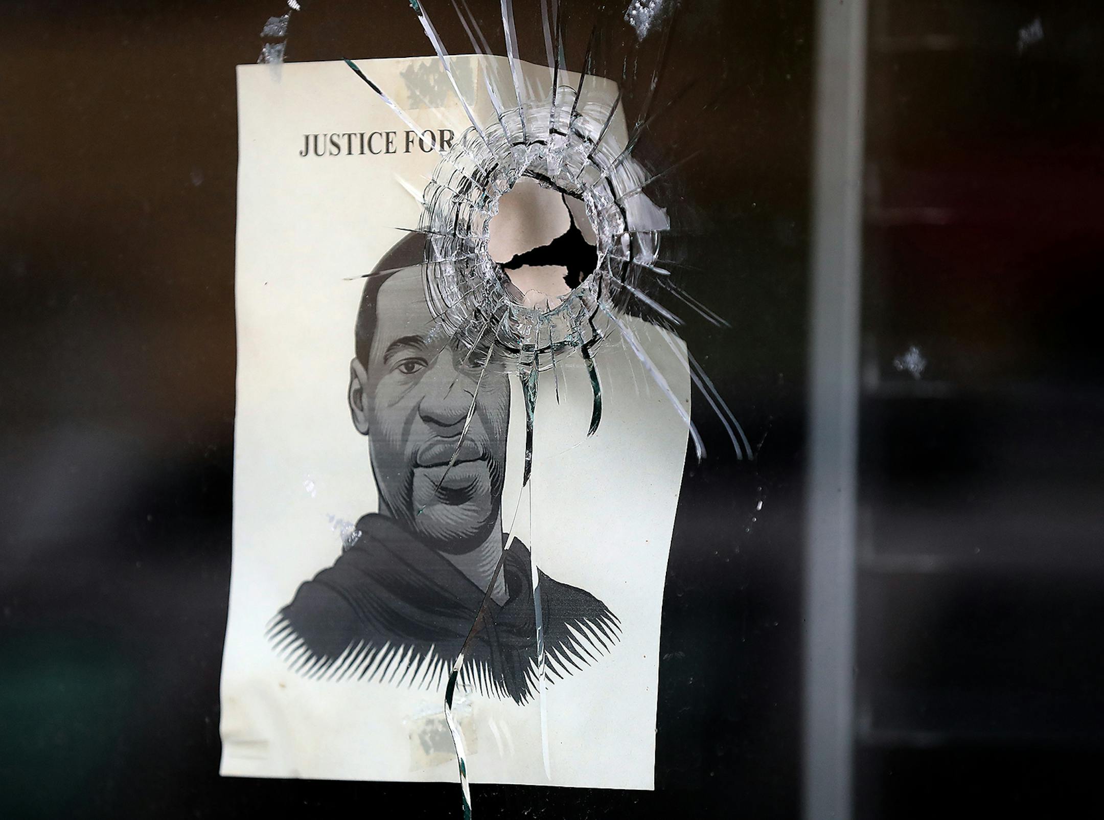 A window on a business was vandalized at George Floyd Square along Chicago Avenue and 38th St. E. and seen Wednesday in Minneapolis.