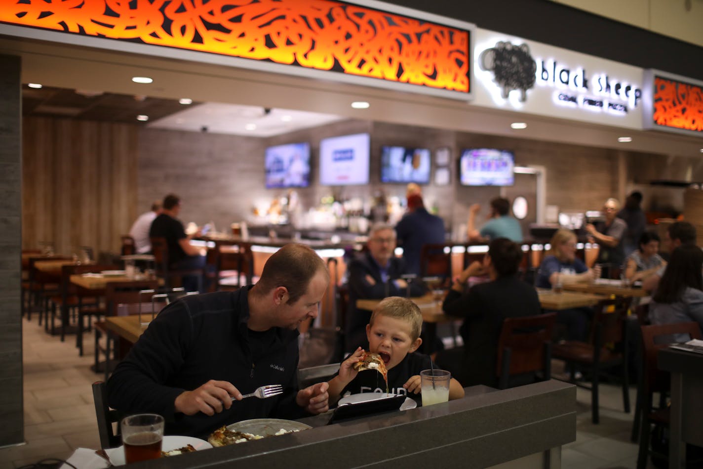 MSP airport is home to loads of new shops and restaurants that are the result of the current refresh of the Lindbergh Terminal. Patrons at Black Sheep Pizza are pictured in 2017.