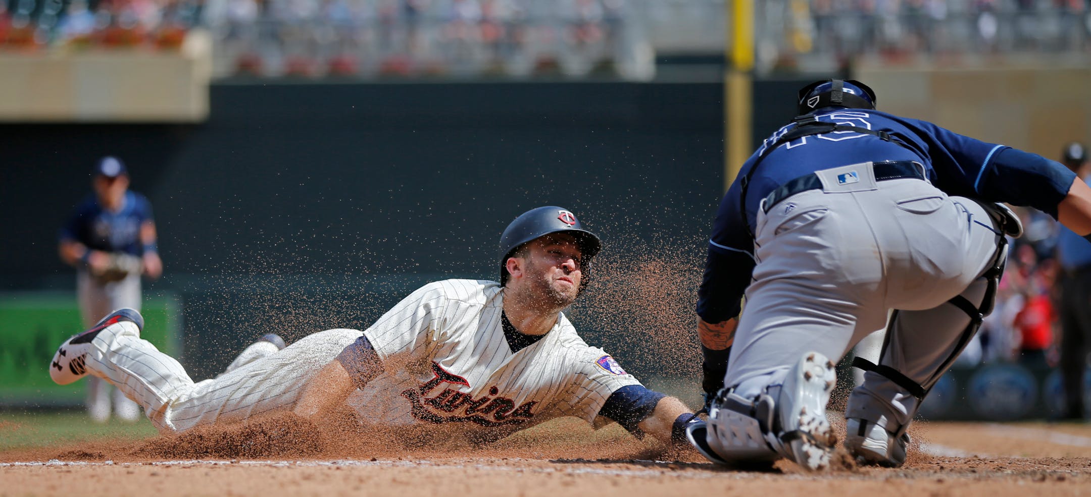 Brian Dozier was out at home plate in the sixth inning