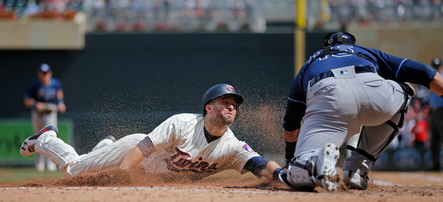 Brian Dozier was out at home plate in the sixth inning