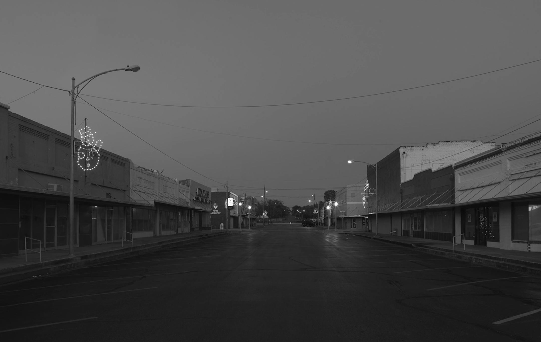 An image of a deserted main drag in Hearne, Texas. photo by Alec Soth