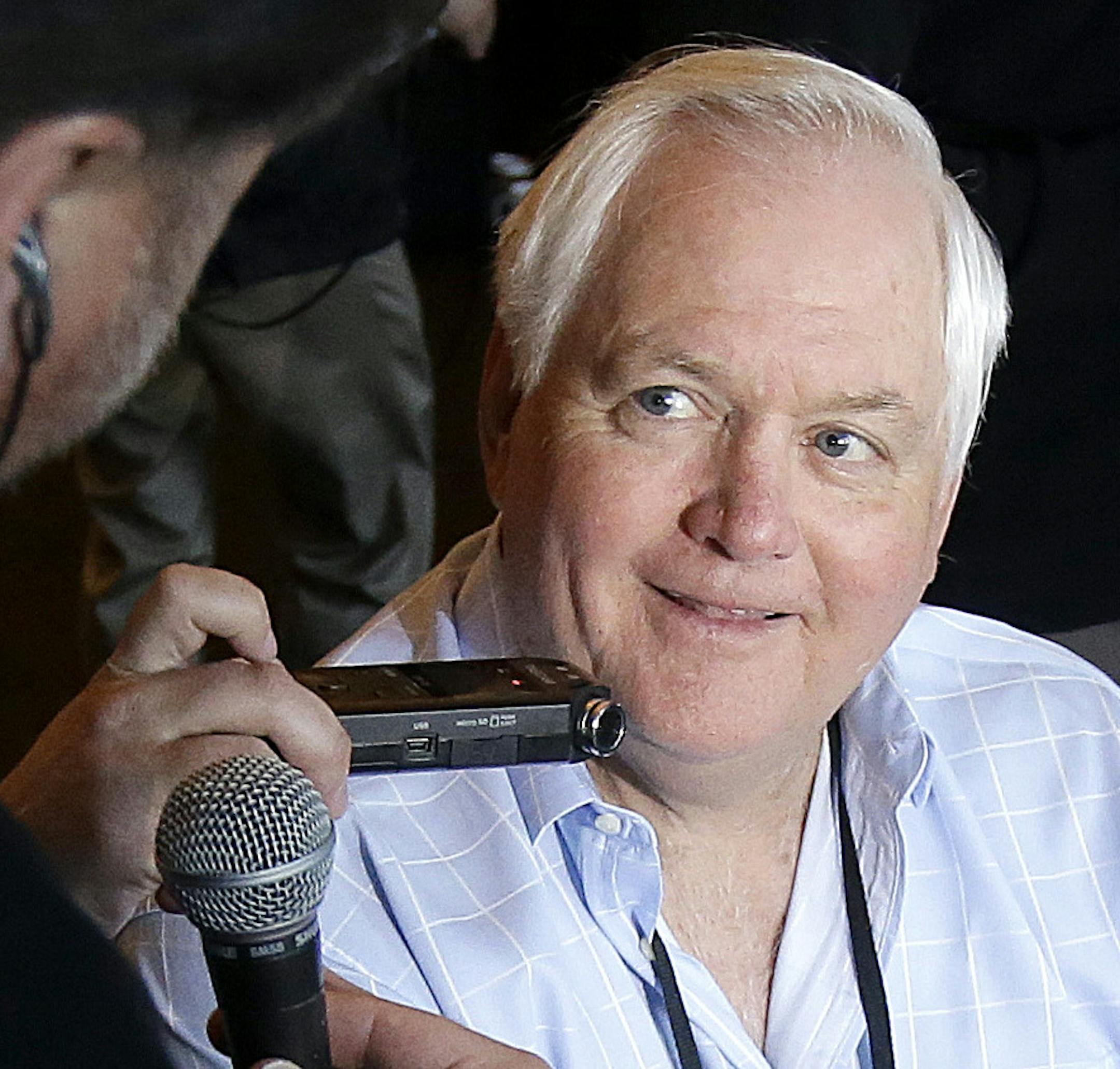 Denver Broncos defensive coordinator Wade Phillips, center, speaks to reporters in Santa Clara, Calif., Wednesday, Feb. 3, 2016. The Denver Broncos will play the Carolina Panthers in Super Bowl 50 Sunday, Feb. 7, 2016. (AP Photo/Jeff Chiu)