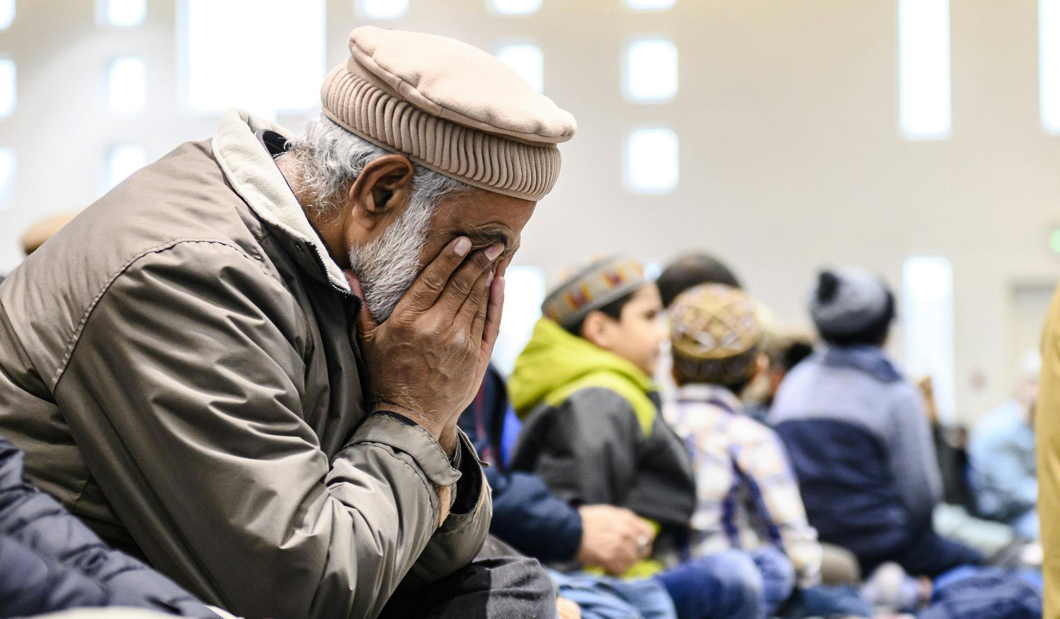 Members of Ahmadiyya Muslim Jama'at Canada gather at the Baitul Islam Mosque during a special prayer in in Vaughan, Ontario for the victims of the deadly attacks on mosques in New Zealand on Friday, March 15, 2019. (Christopher Katsarov/The Canadian Press via AP)