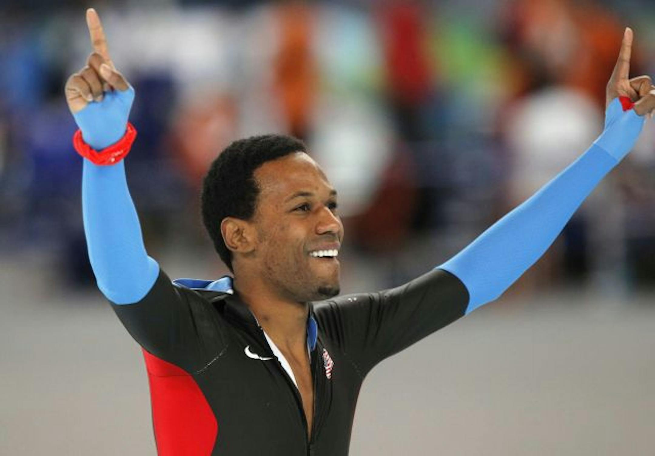 American Shani Davis celebrated his 1,000-meter speedskating victory.
