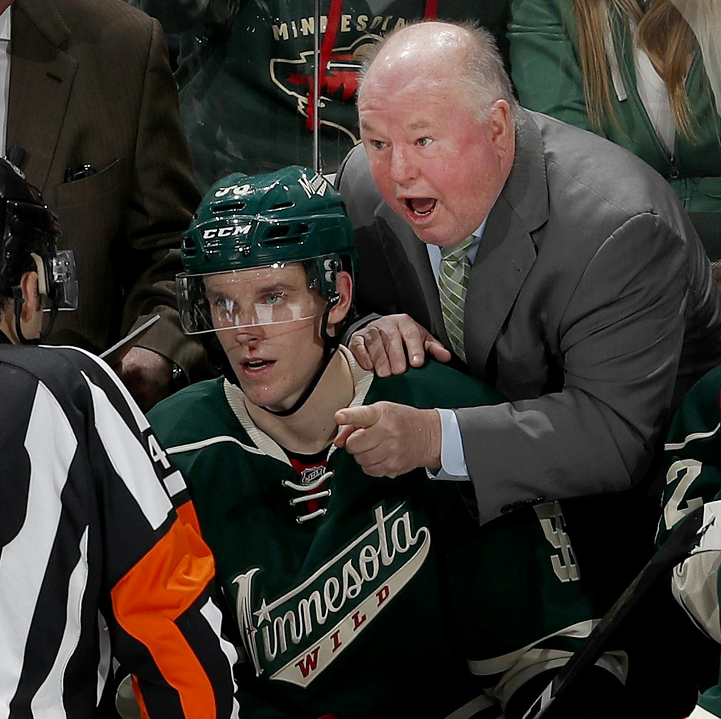 Wild head coach Bruce Boudreau discussed a non-goal call with referee Jake Brenk (42) in the third period. ] CARLOS GONZALEZ cgonzalez@startribune.com - December 11, 2016, St. Paul, Minnesota, NHL Hockey, Xcel Energy Center, Minnesota Wild vs. St. Louis Blues