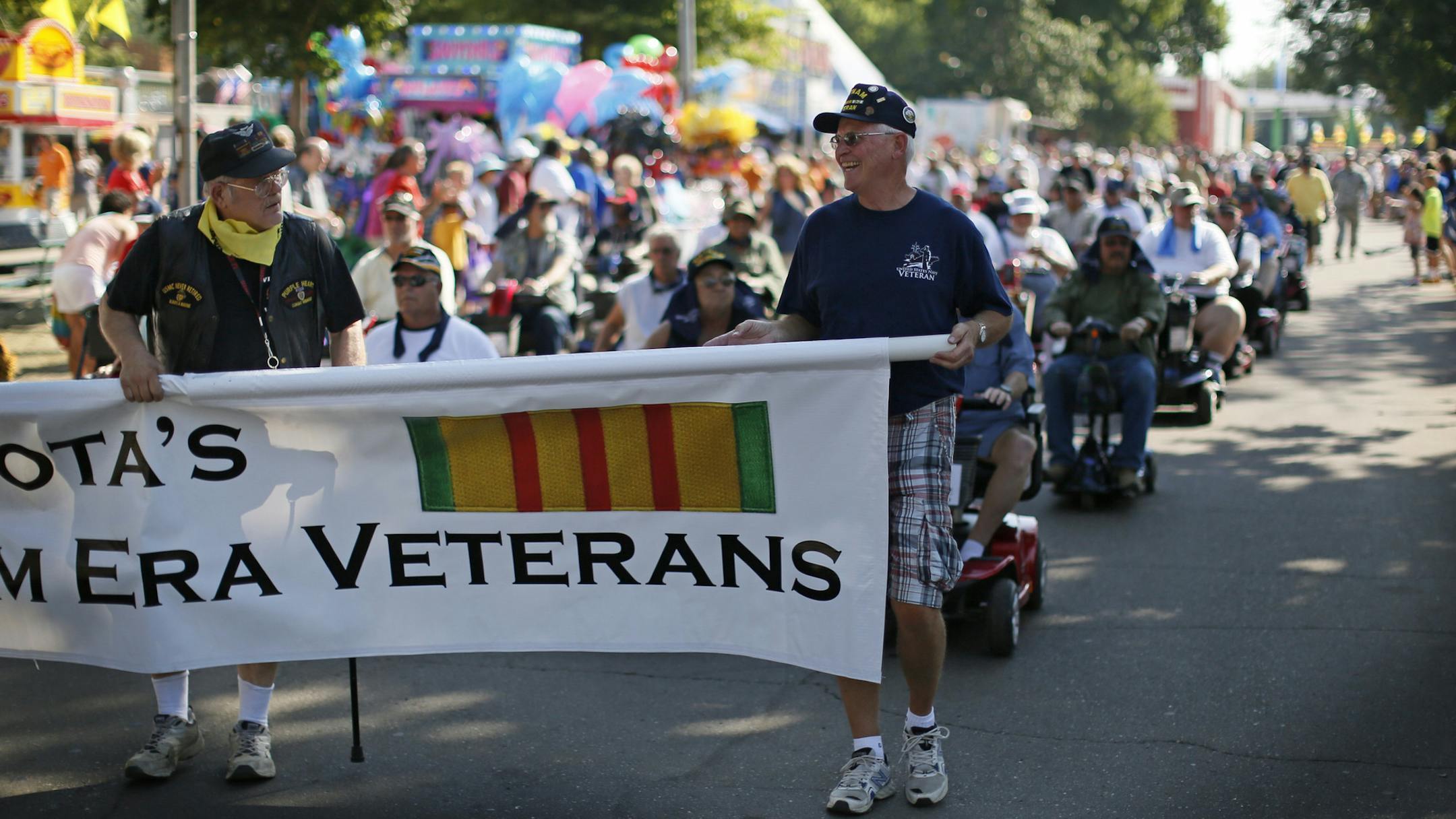 More than 1,000 Vientam era veterans marched on Tuesday morning at the Minnesota State Fair as part of military appreciation day. ] BRIAN PETERSON ‚Ä¢ brianp@startribune.com Falcon Heights, MN - 08/27//2013