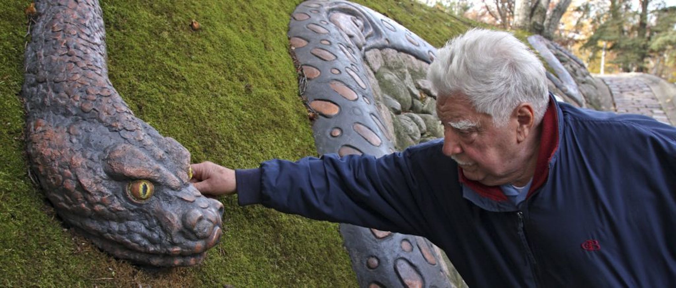 BRUCE BISPING � bbisping@startribune.com Eagan, MN., Monday, 10/22/2007. Artist and retired professor Anthony Caponi talked about his snake sculpture, a favorite with children visiting his art park in Eagan.