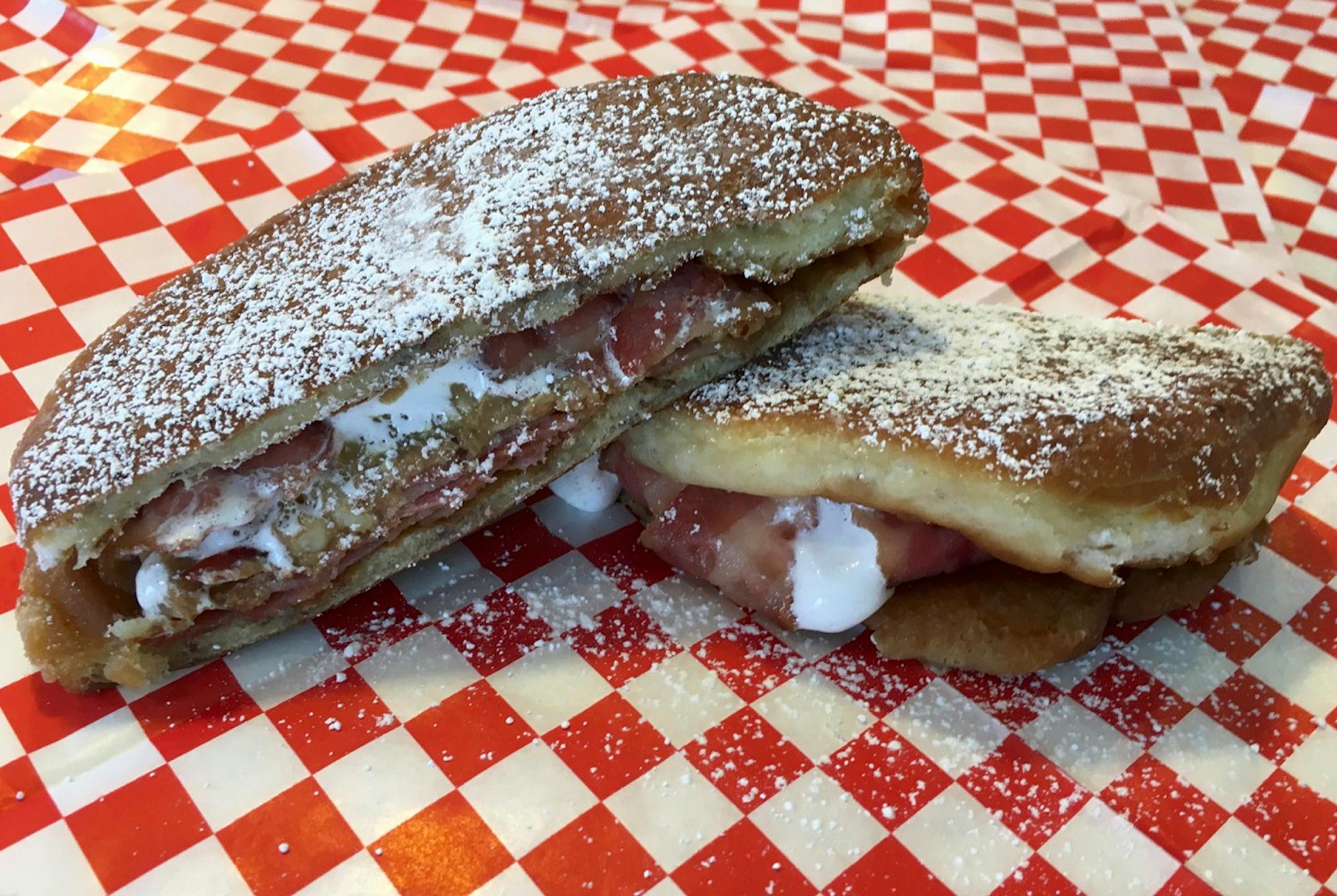Bacon Fluffernutter is a grilled cinnamon bun sandwich with a bacon, peanut butter and marshmallow cream filling. At The Sandwich Stop on the west side of Clough St. between Carnes & Judson avenues.