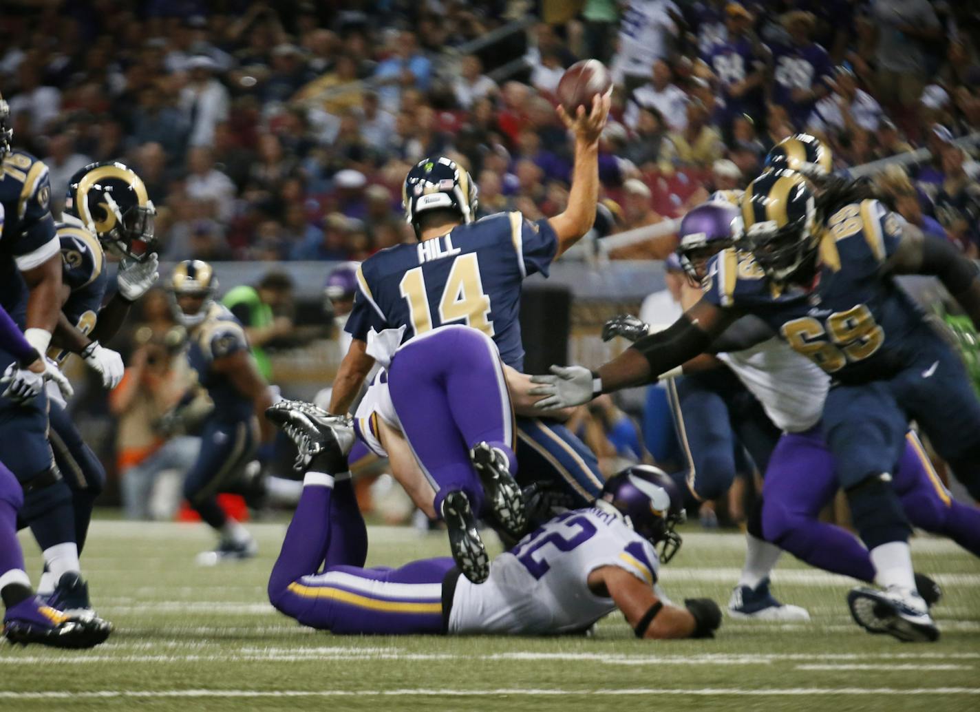 Vikings Harrison Smith hits Rams QB Shaun Hill hard in the 2nd quarter.